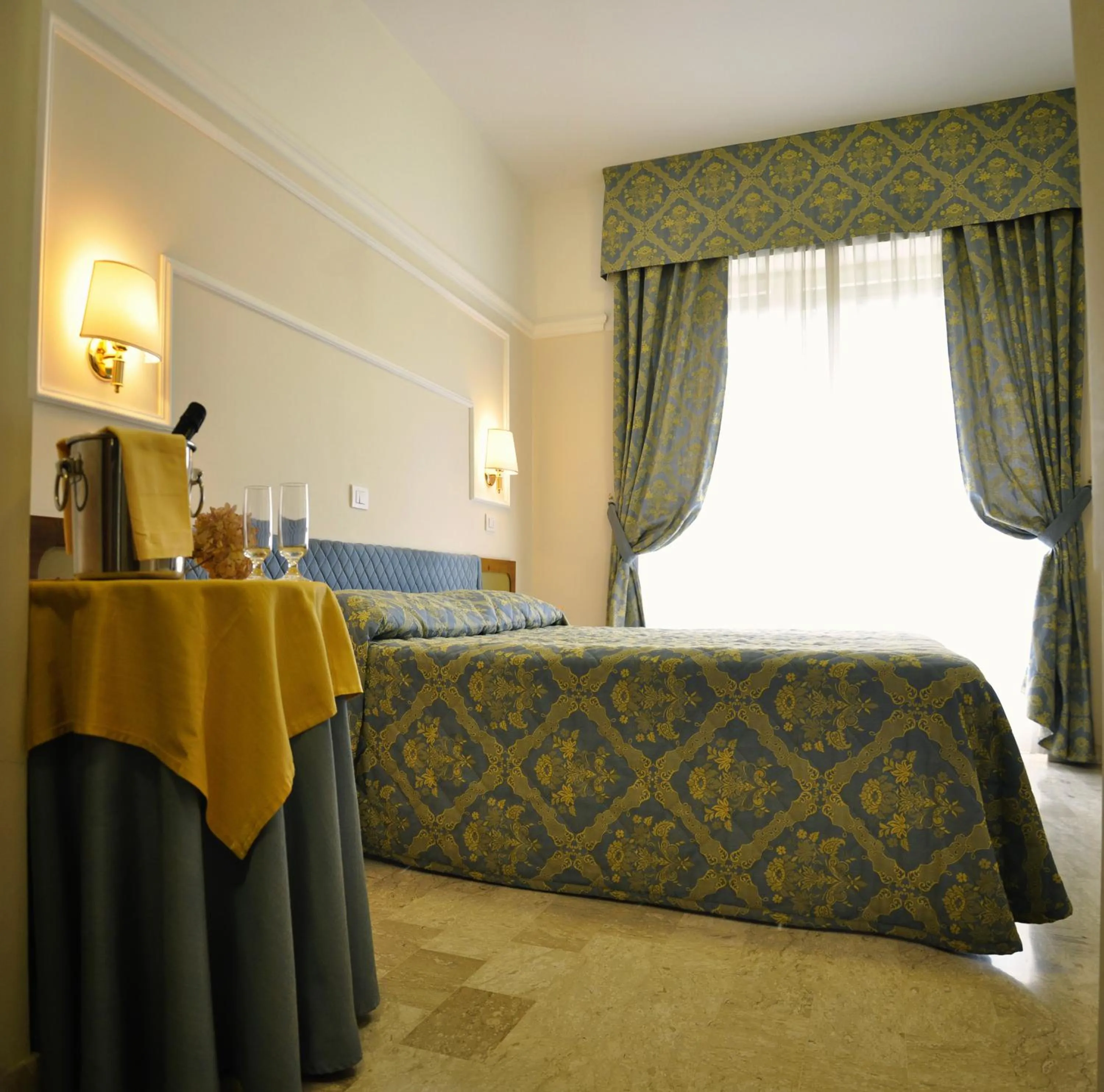 Bedroom in Mondial Park Hotel