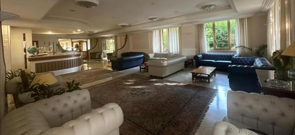 Living room in Mondial Park Hotel