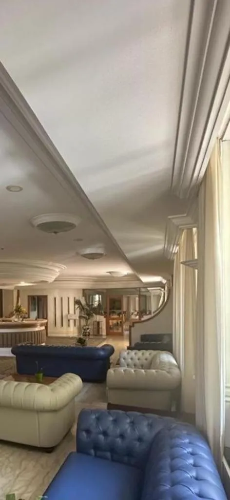 Living room in Mondial Park Hotel