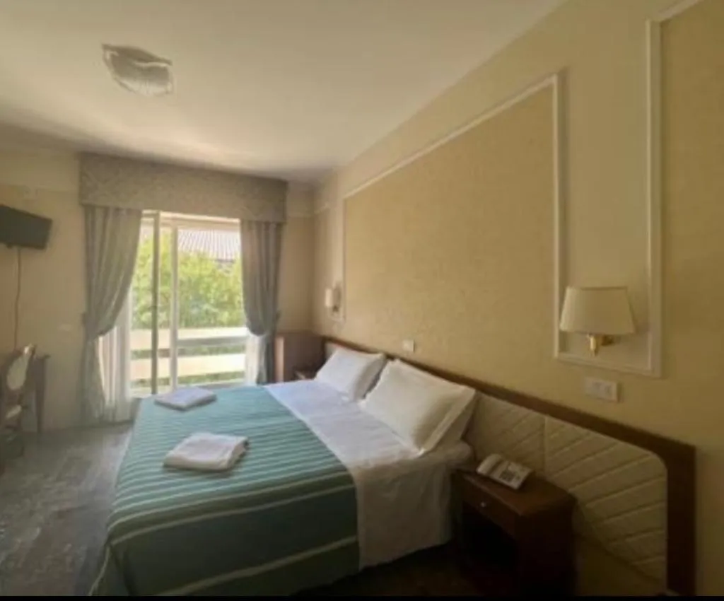 Bed in Mondial Park Hotel