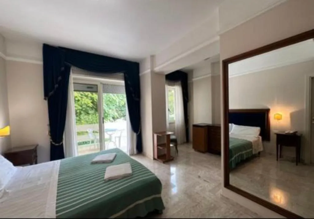 Bed in Mondial Park Hotel