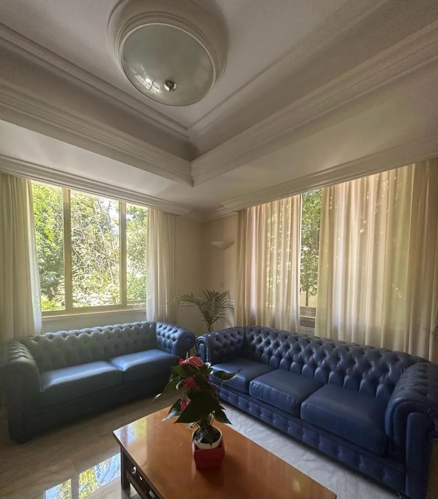 Living room in Mondial Park Hotel