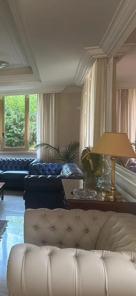 Living room in Mondial Park Hotel