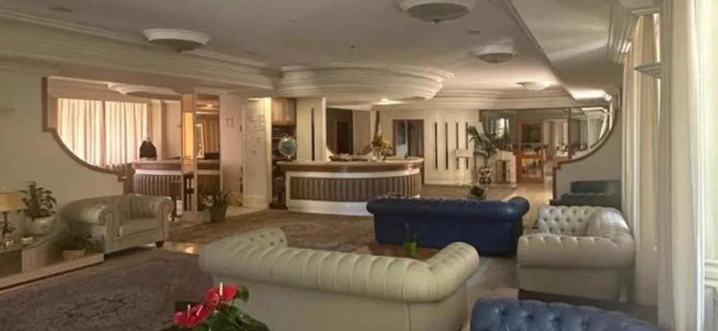 Living room in Mondial Park Hotel