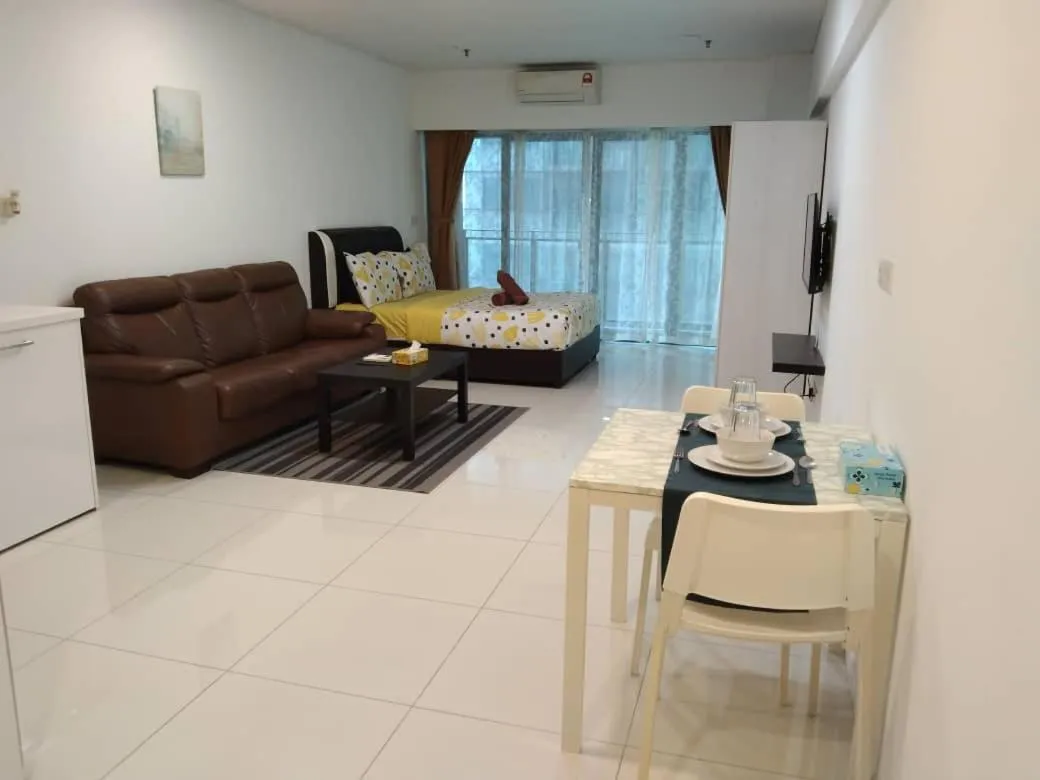 Bed in Summer Suites Studios