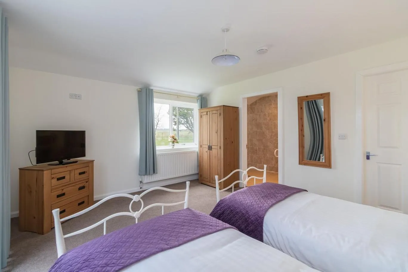 Bed in The Grainary Cottages