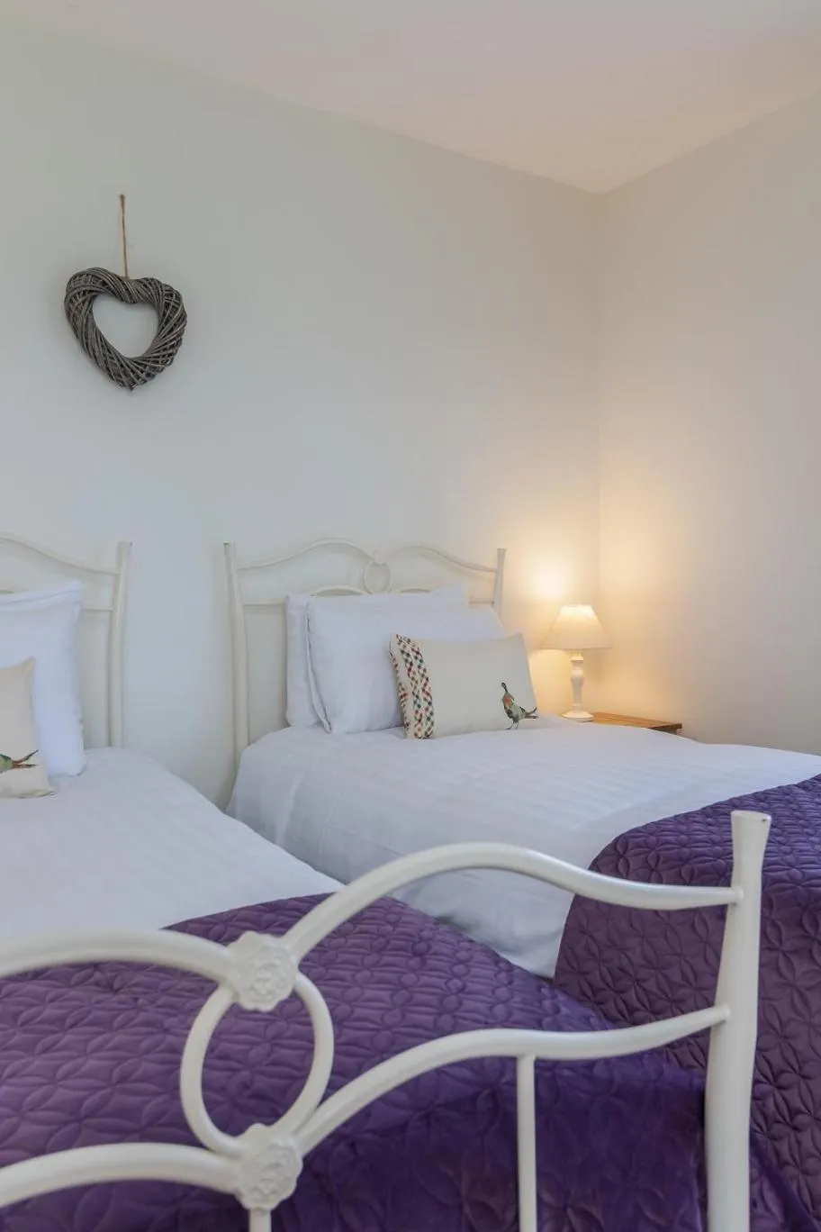 Bed in The Grainary Cottages