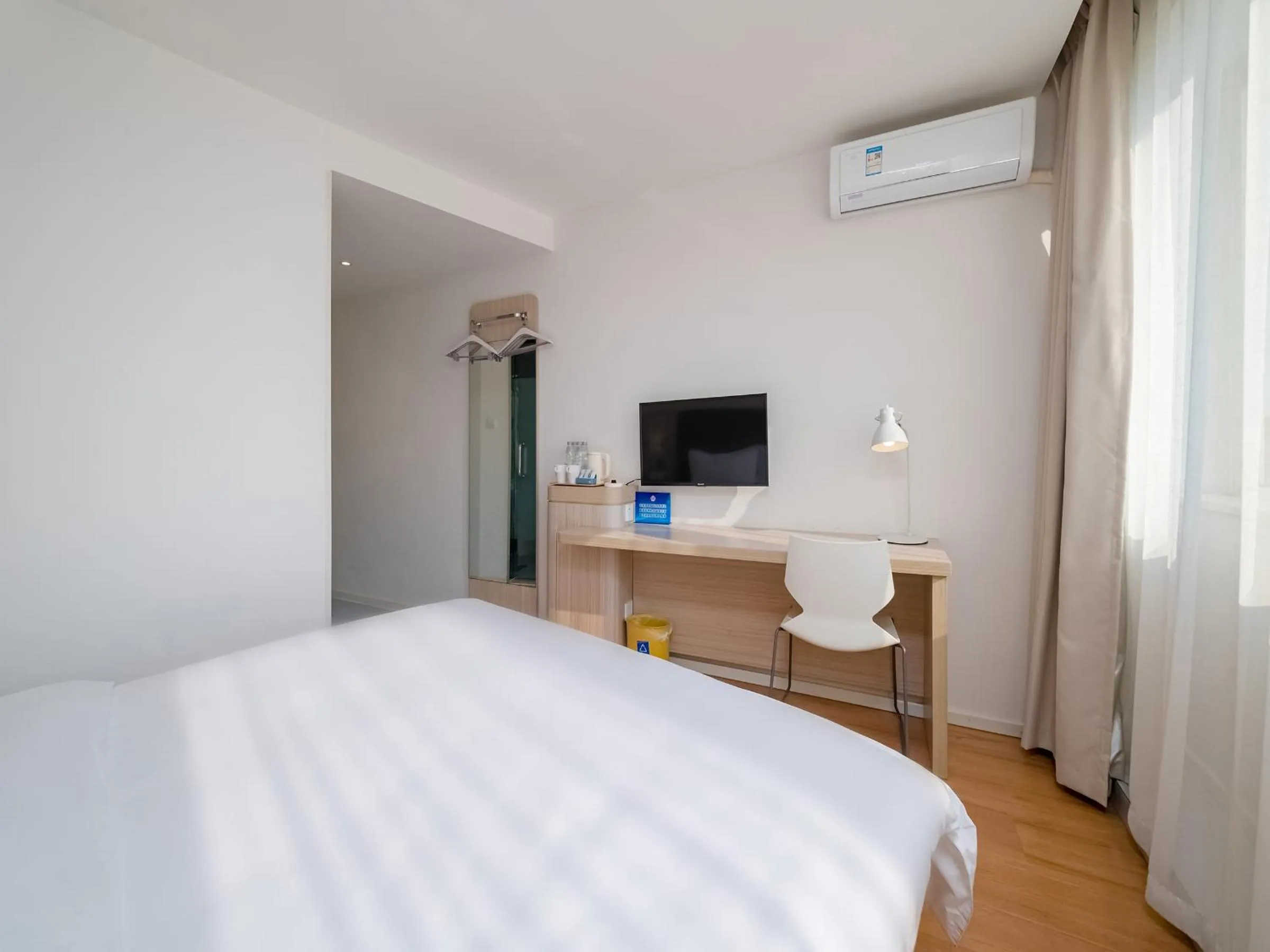 Bed in Hanting Hotel Beijing Qianmen Taoranting