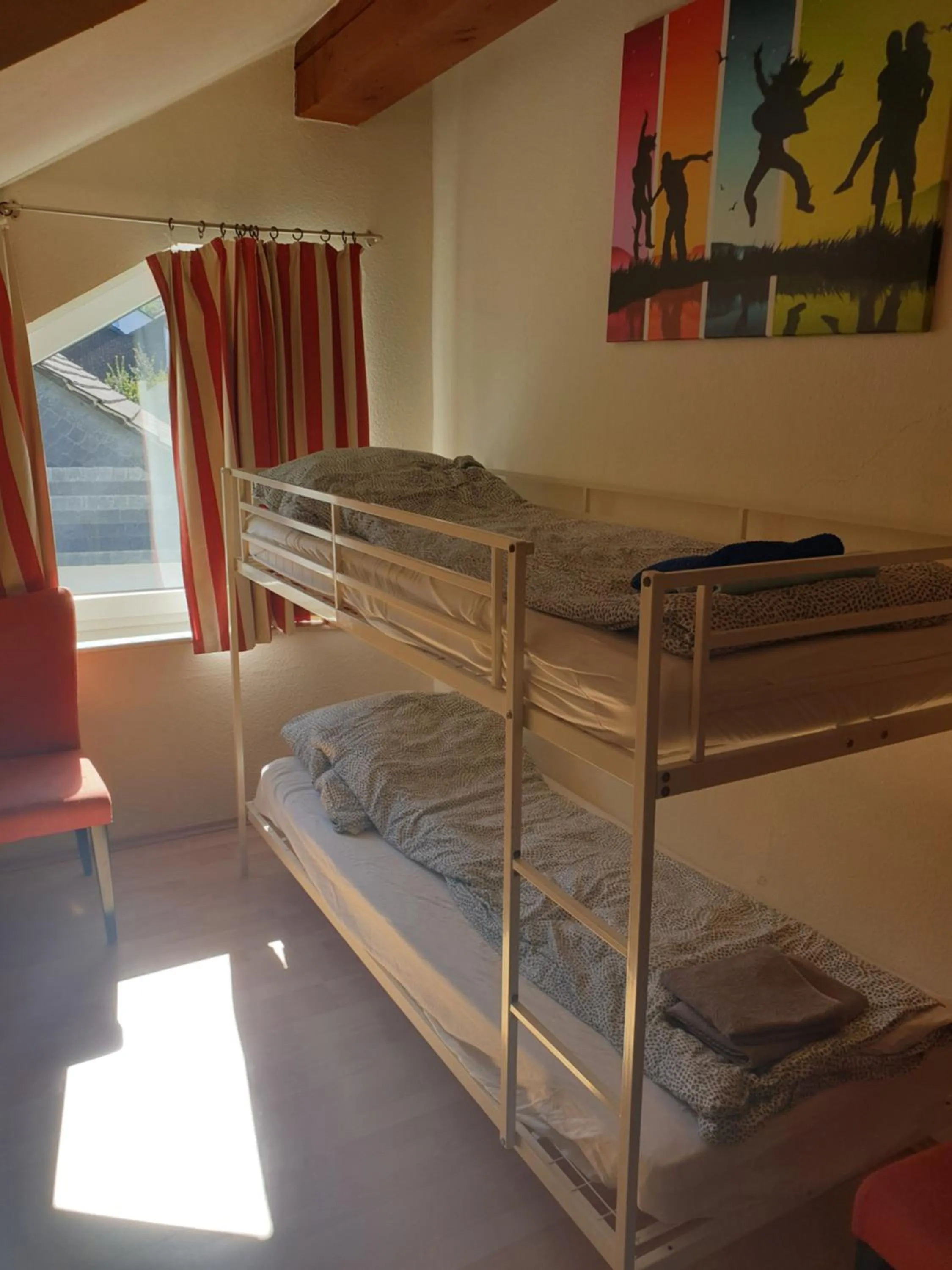 Bed in Famile Hotel Kameleon