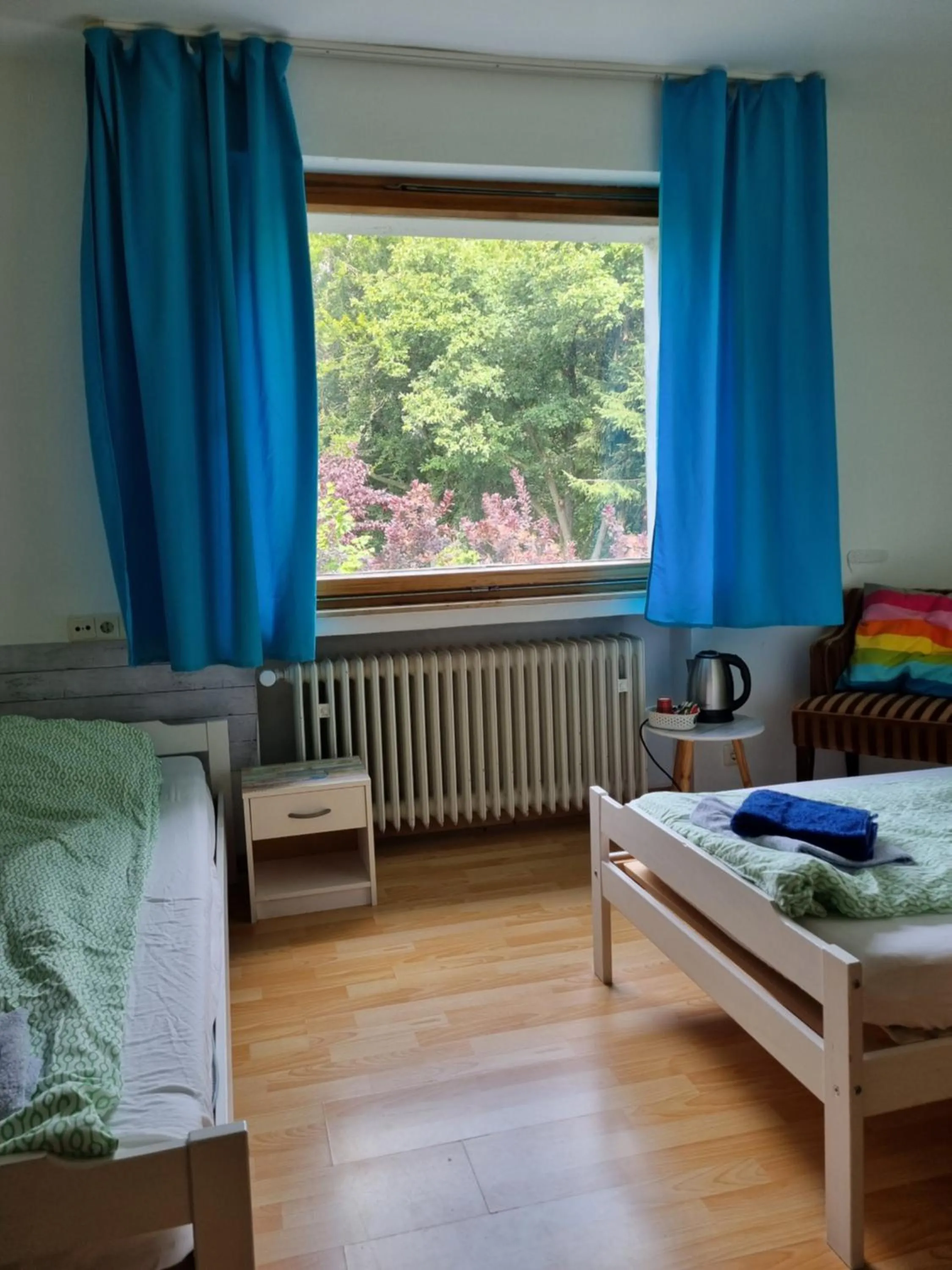 Bed in Famile Hotel Kameleon