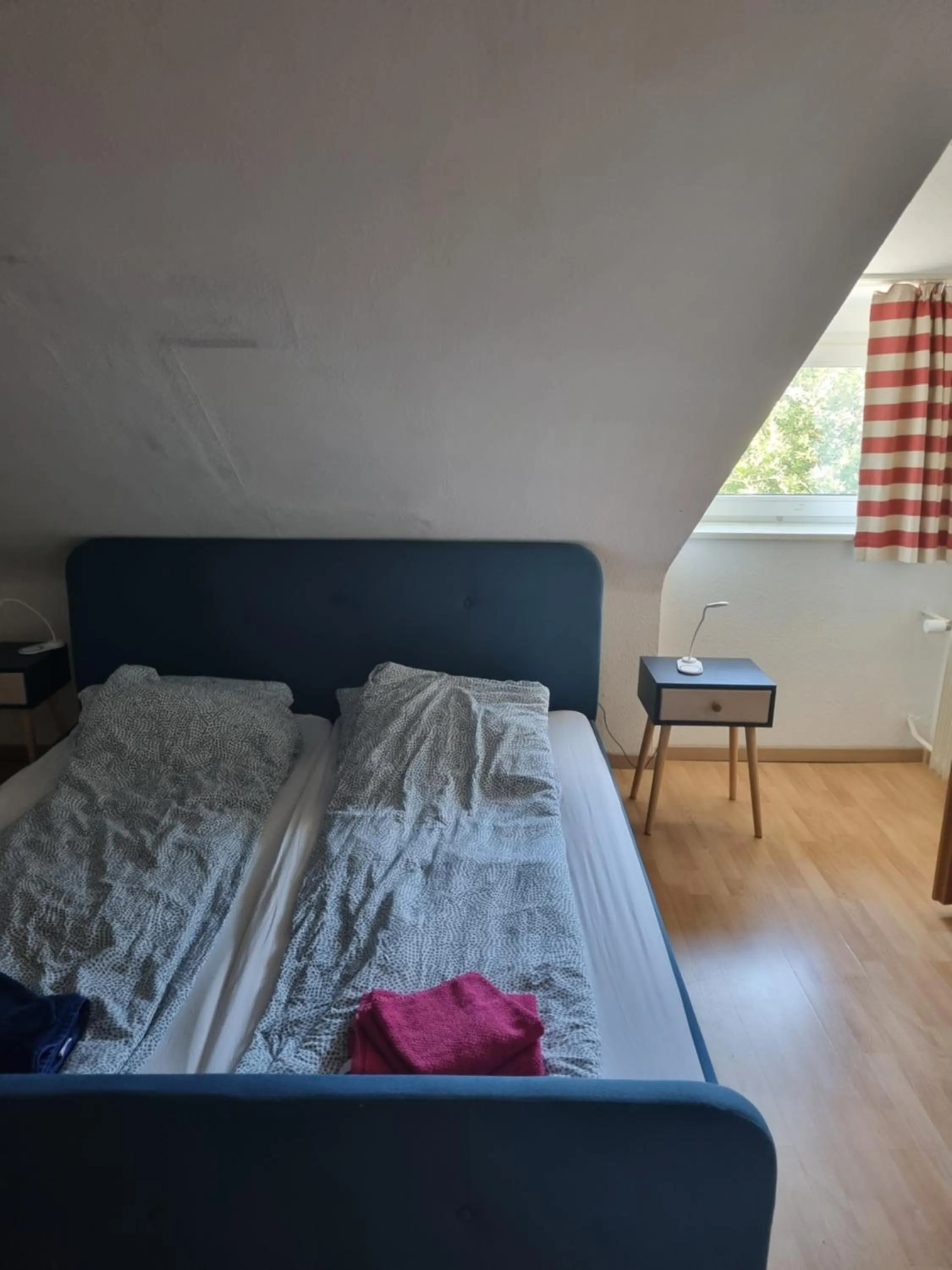 Bed in Famile Hotel Kameleon