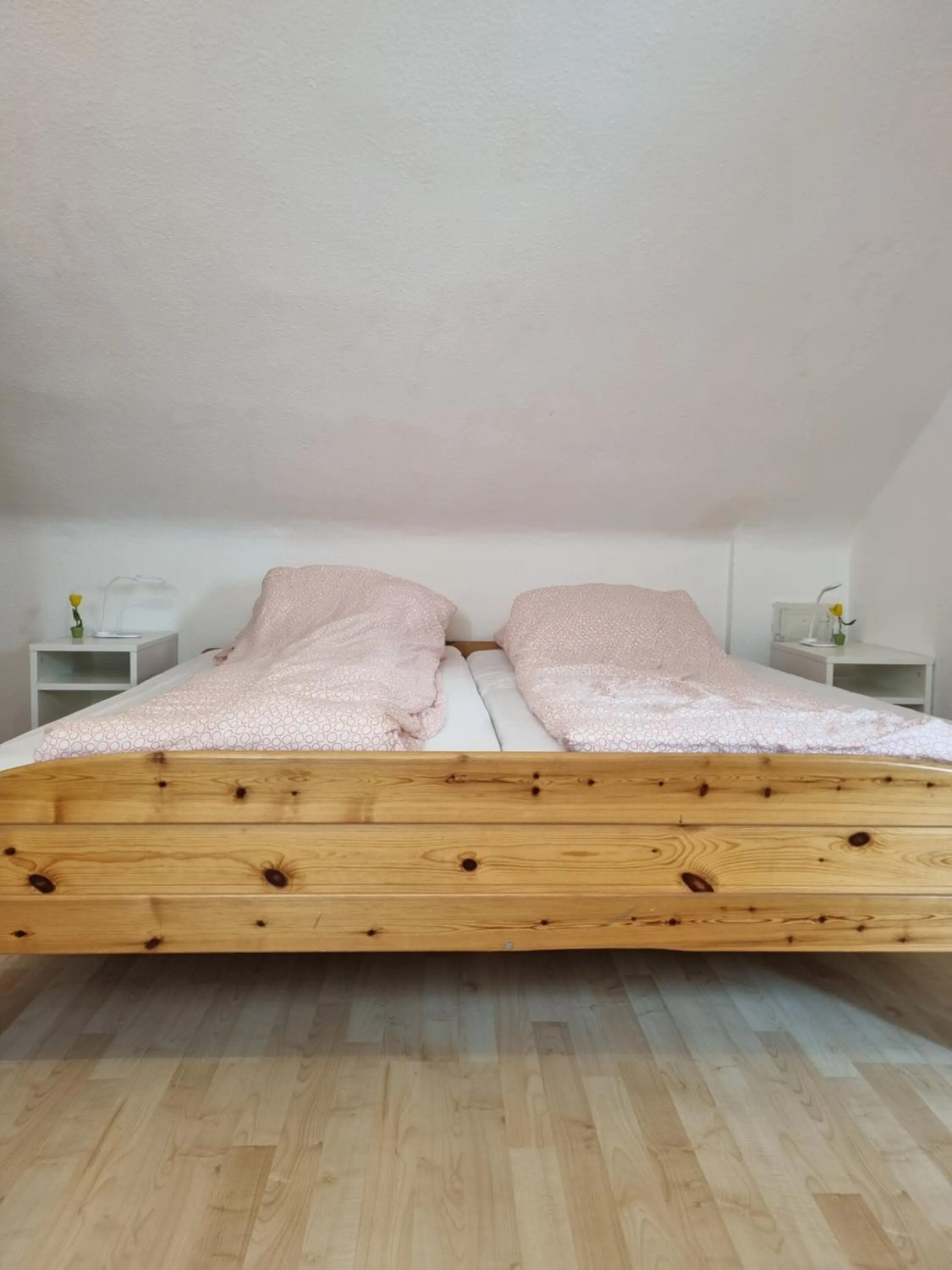 Bed in Famile Hotel Kameleon