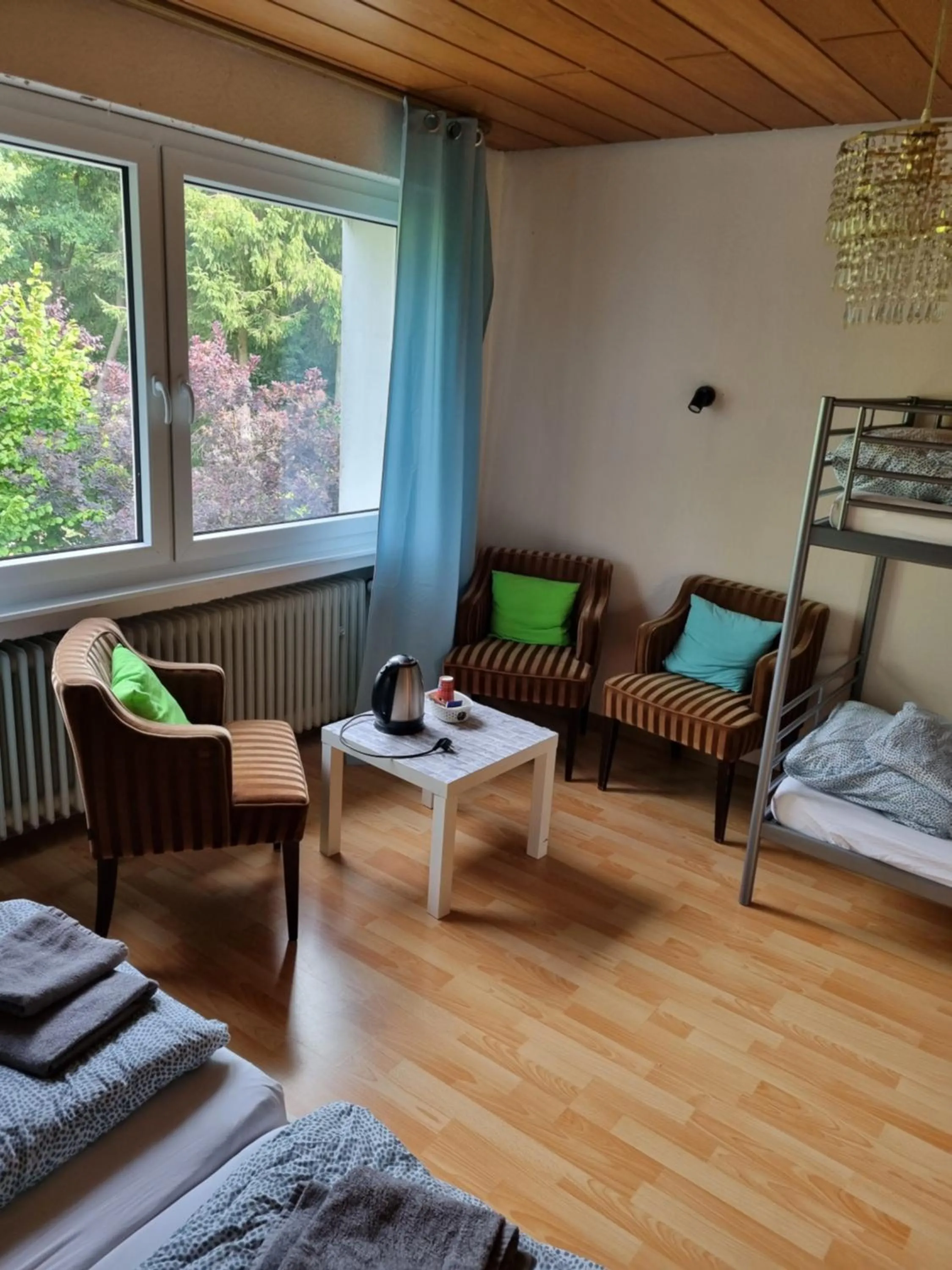 Bed in Famile Hotel Kameleon