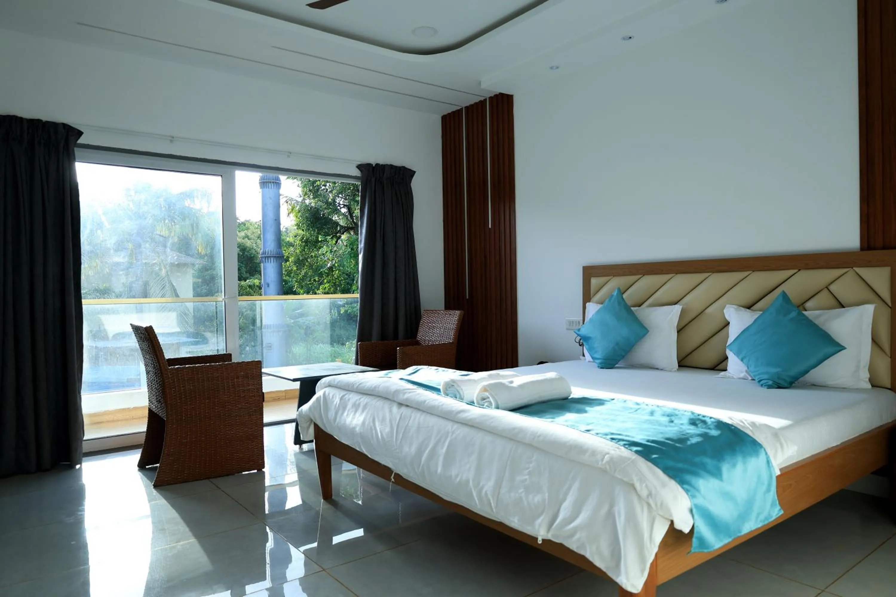 Bed in Prasanna Beach Resort