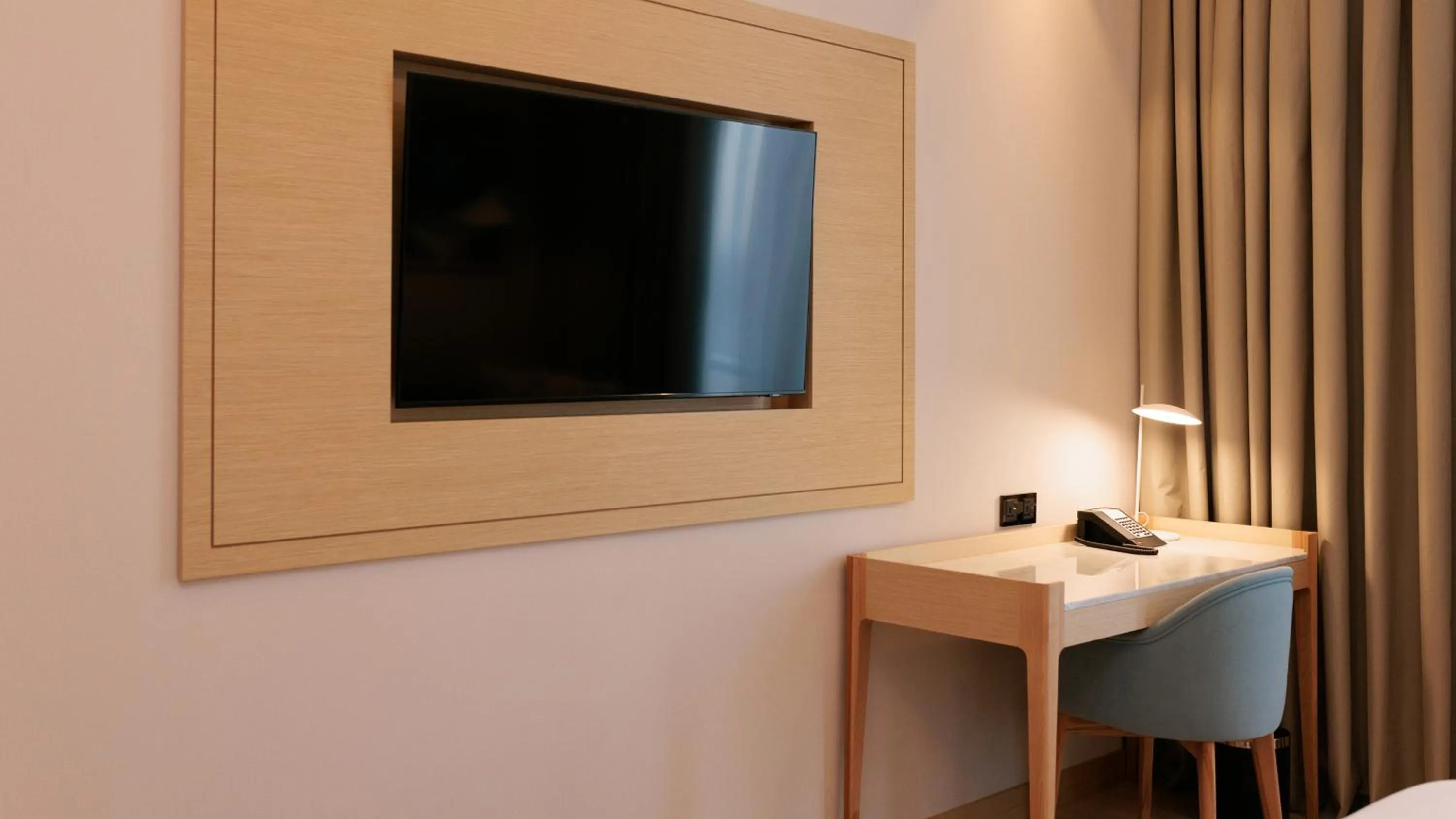 TV and multimedia in Crowne Plaza Dushanbe by IHG