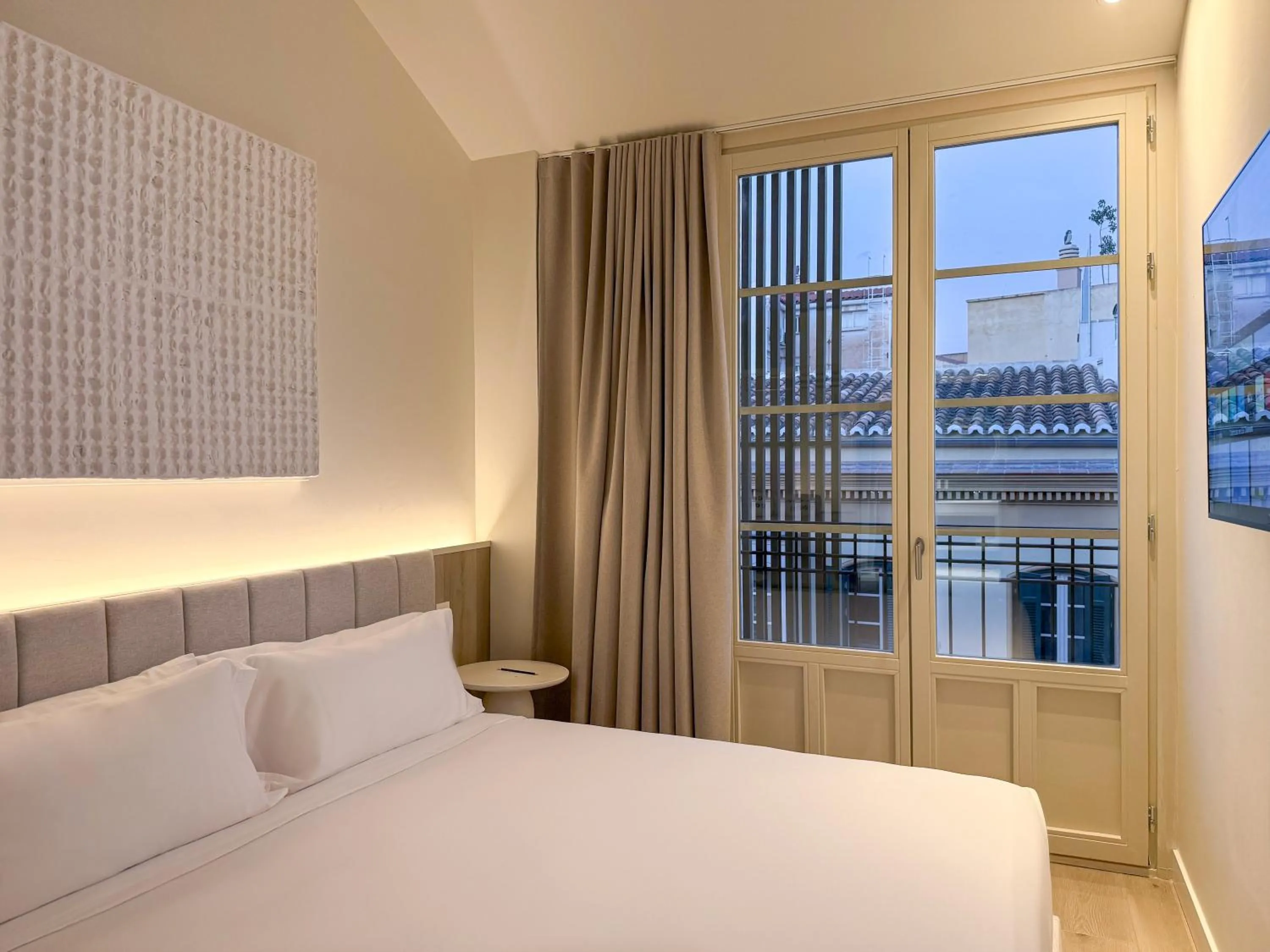 Photo of the whole room, Bed in Coeo Frailes Design Apartments