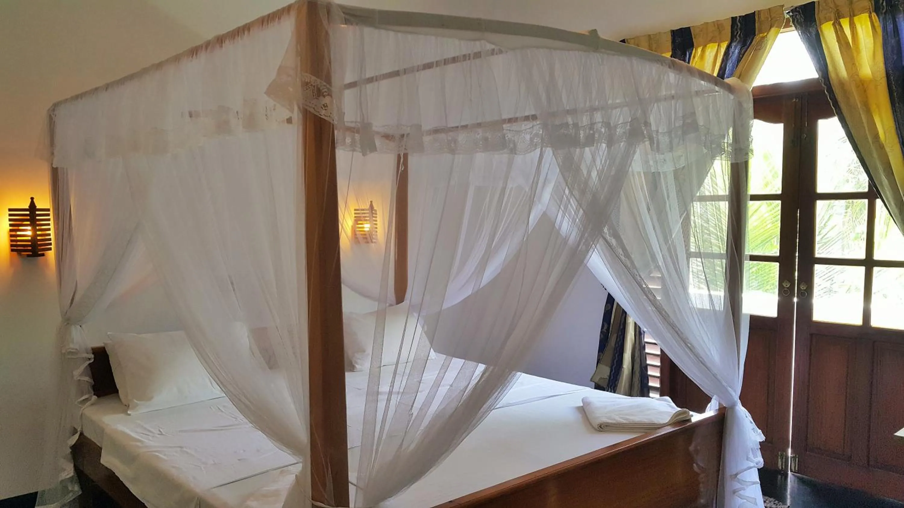 Bed in Sweden Inn Guesthouse