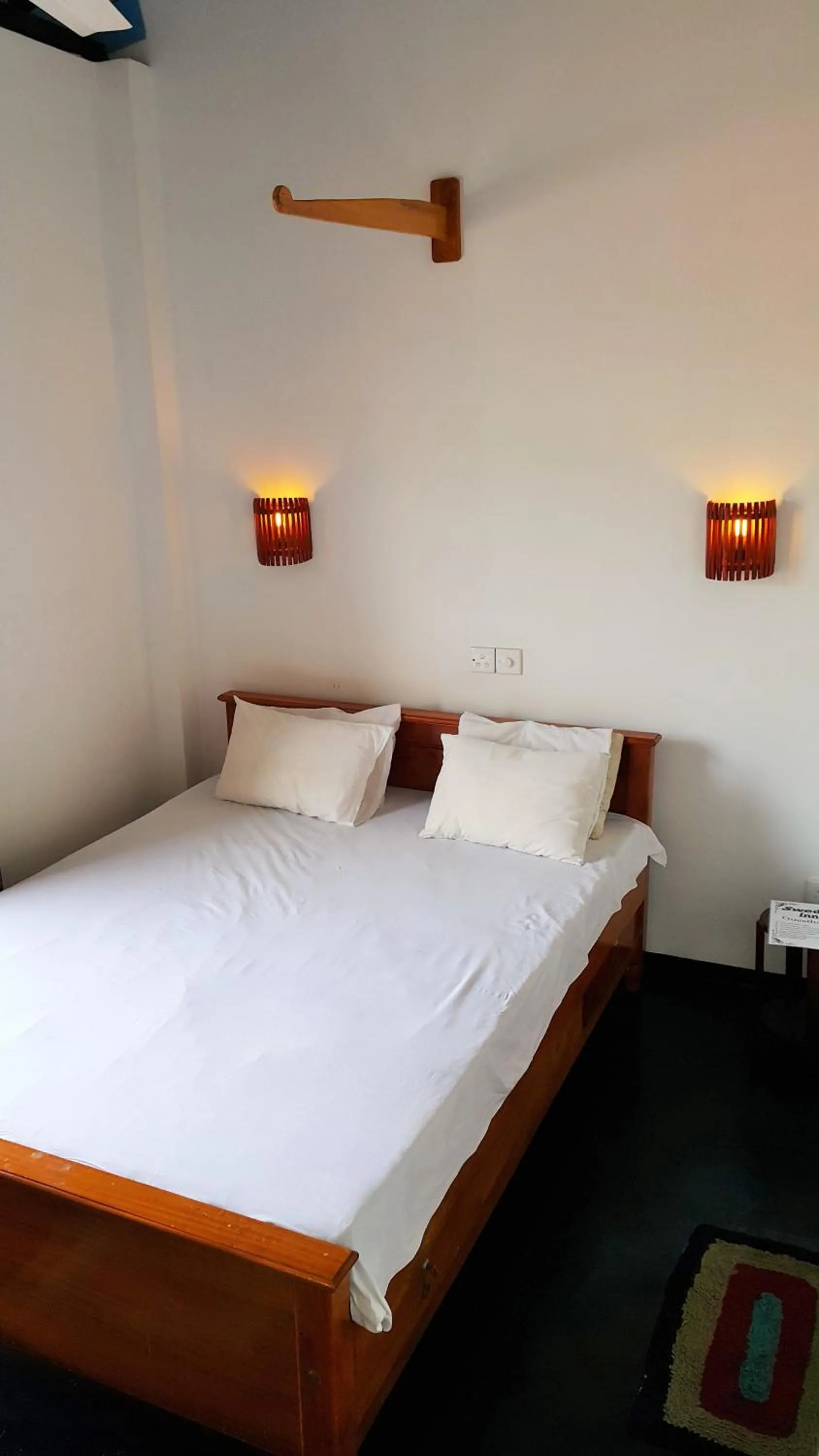 Bed in Sweden Inn Guesthouse
