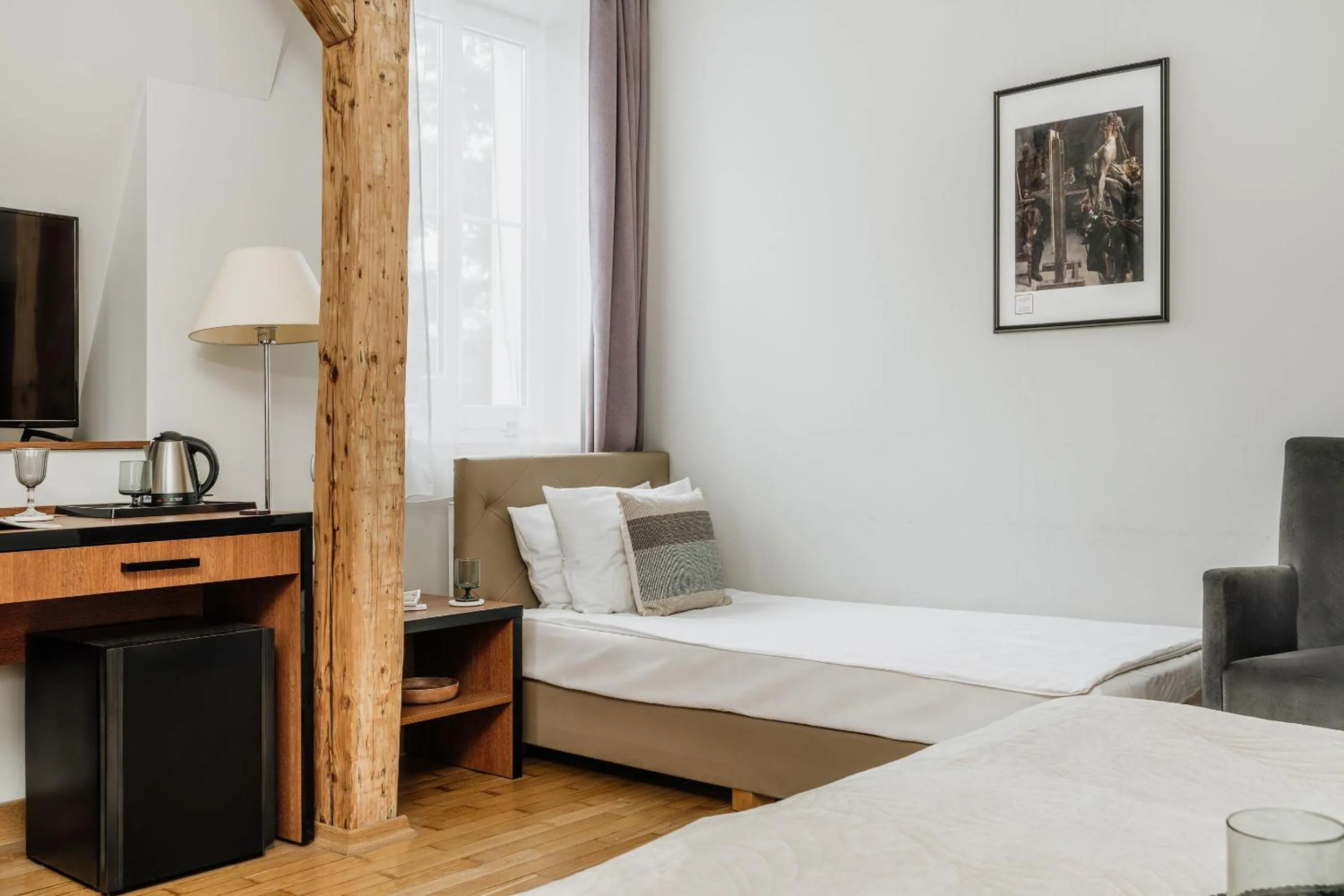 Bed in Grottger Luxury Boutique Hotel City