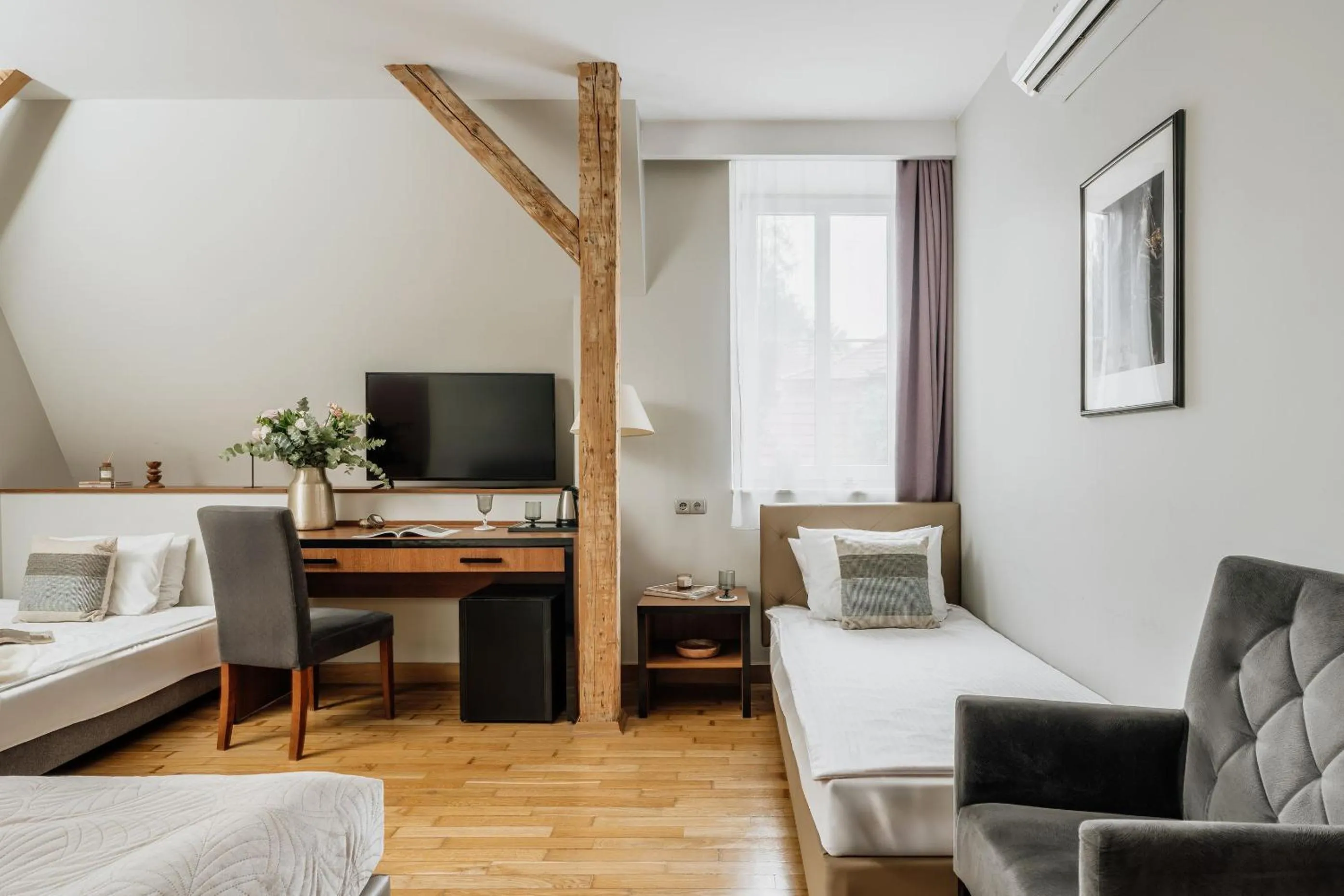 Bed in Grottger Luxury Boutique Hotel City