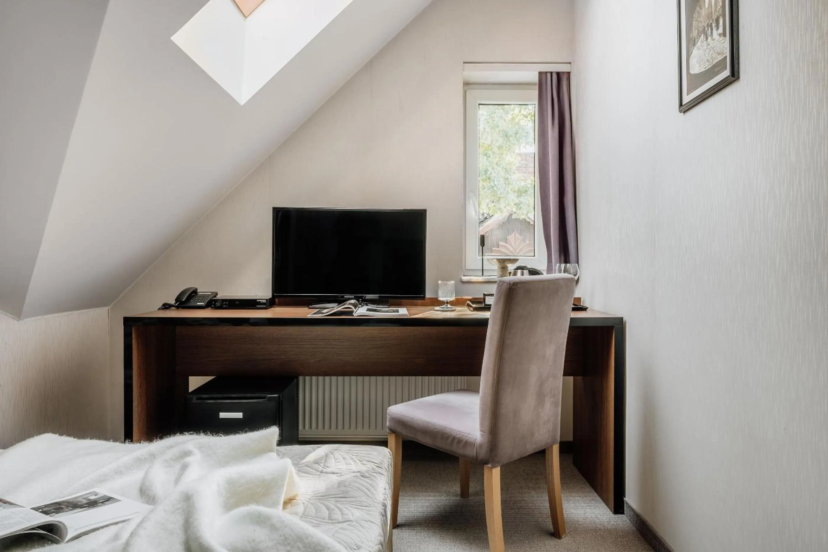 Bed in Grottger Luxury Boutique Hotel City