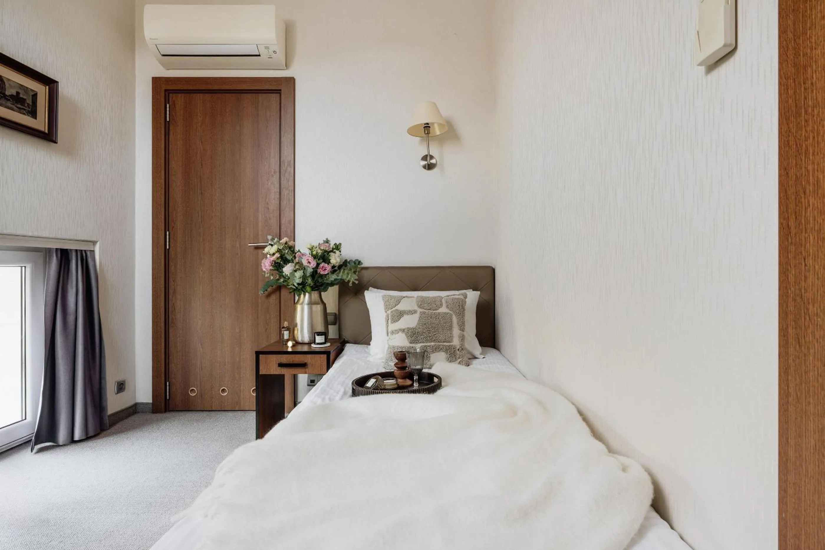 Bed in Grottger Luxury Boutique Hotel City