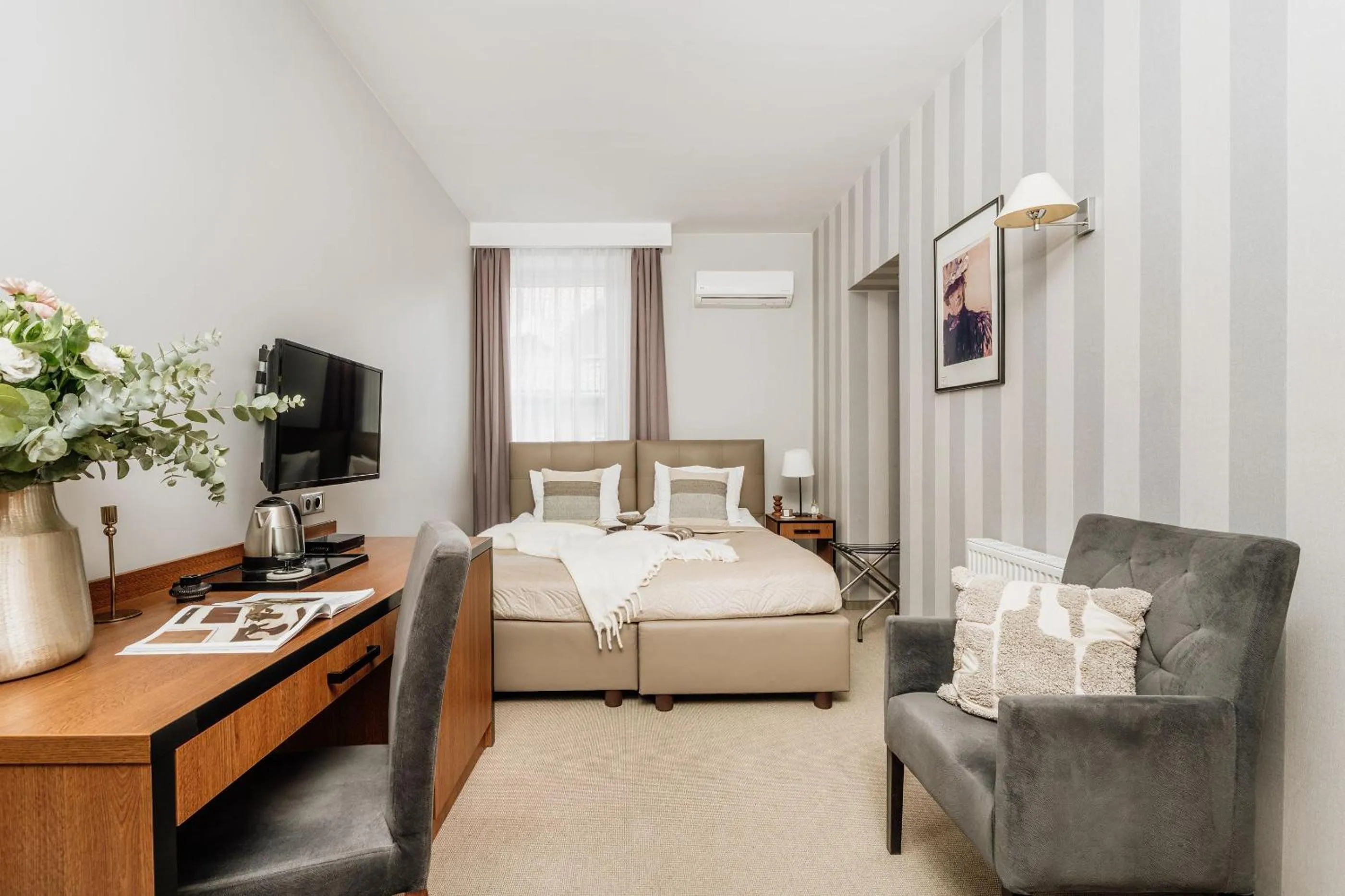 Bed in Grottger Luxury Boutique Hotel City