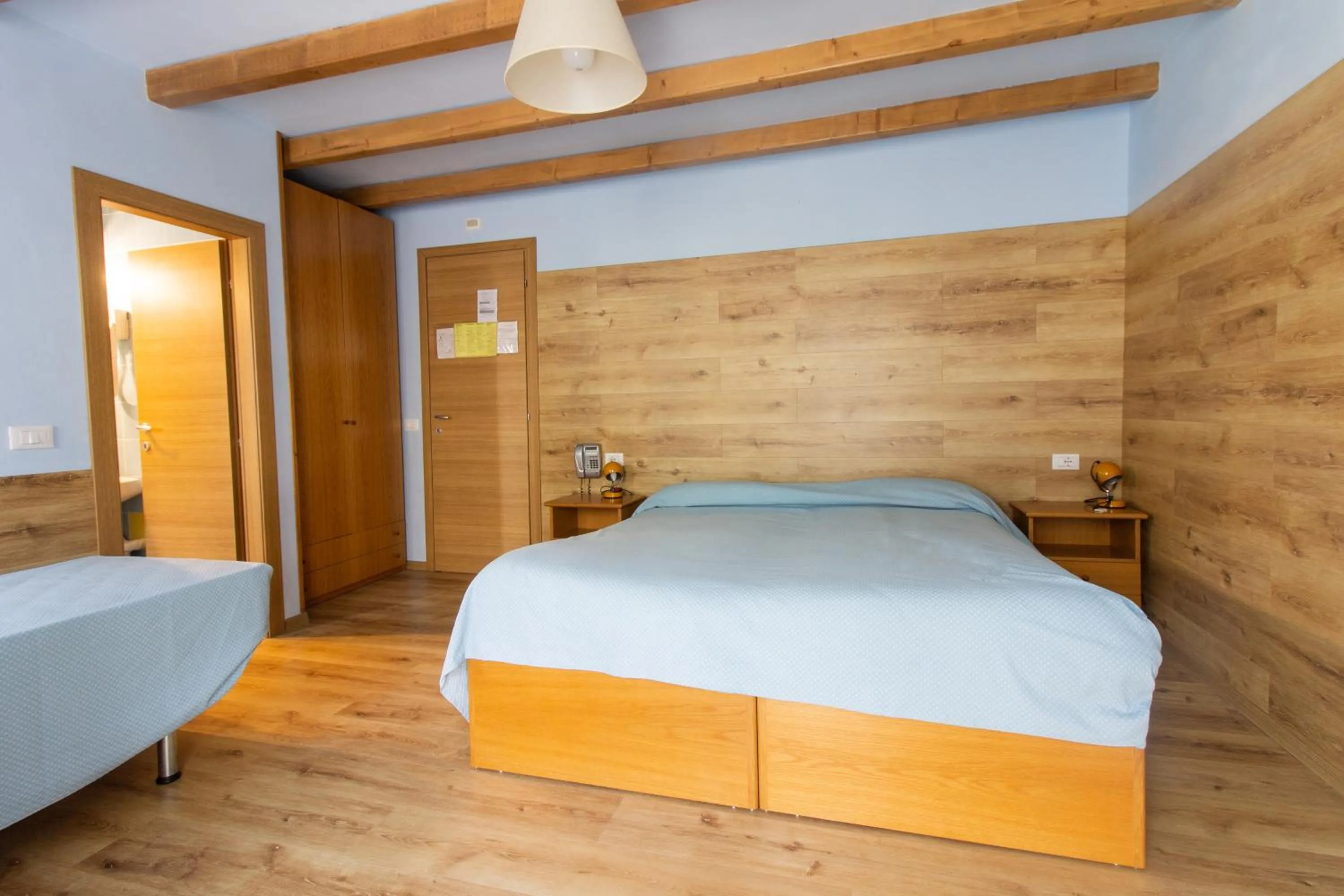 Bed in Albergo Speranza Asiago