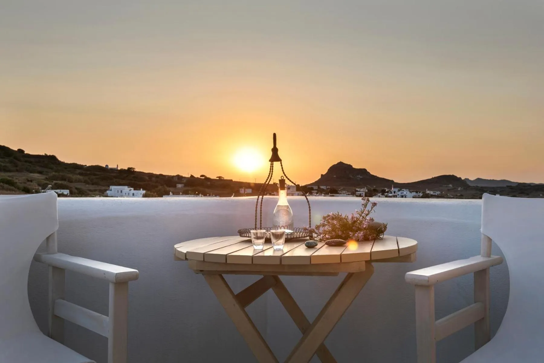 Sunrise in White Tinos Luxury Suites
