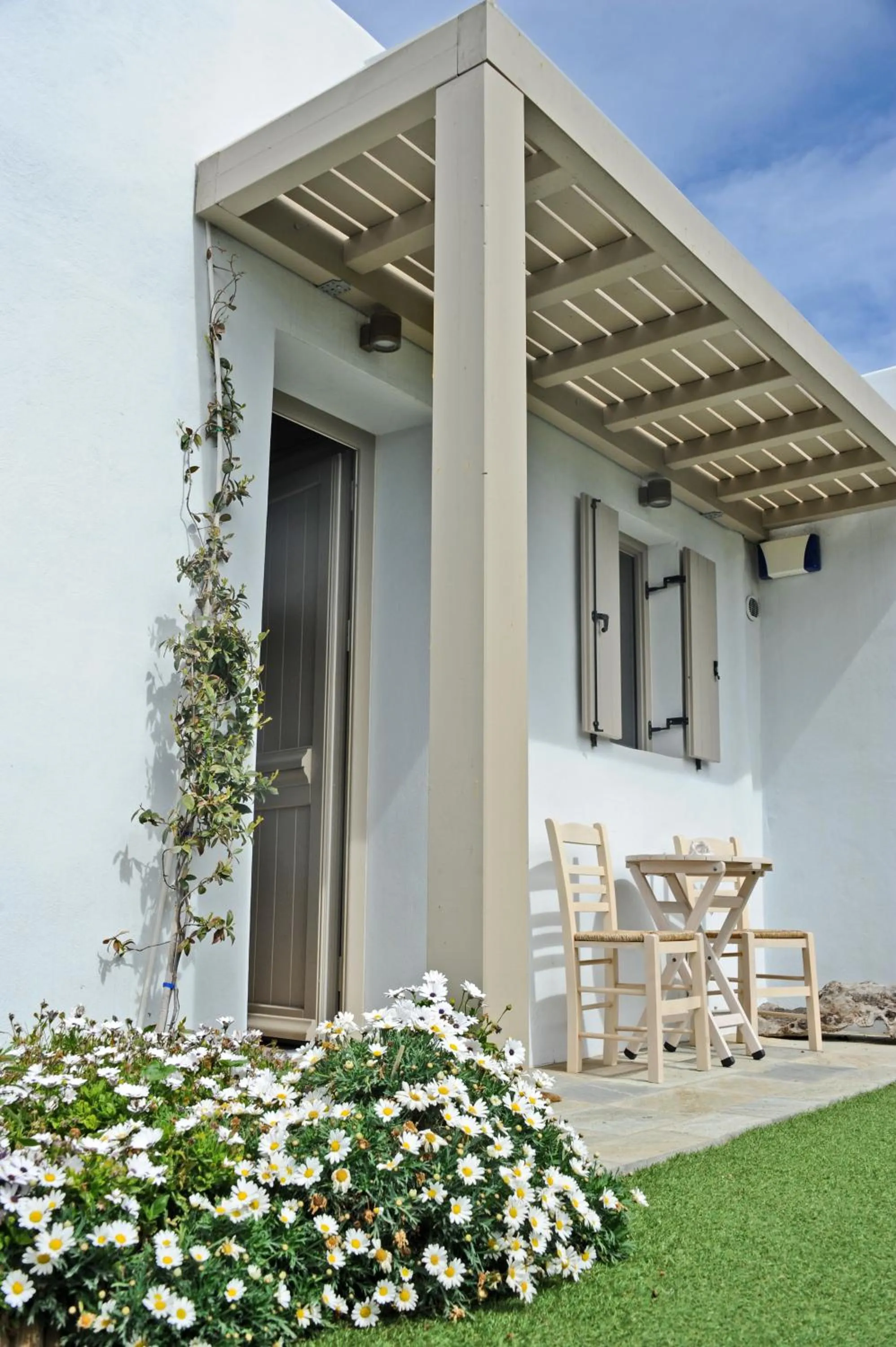 Facade/entrance in White Tinos Luxury Suites