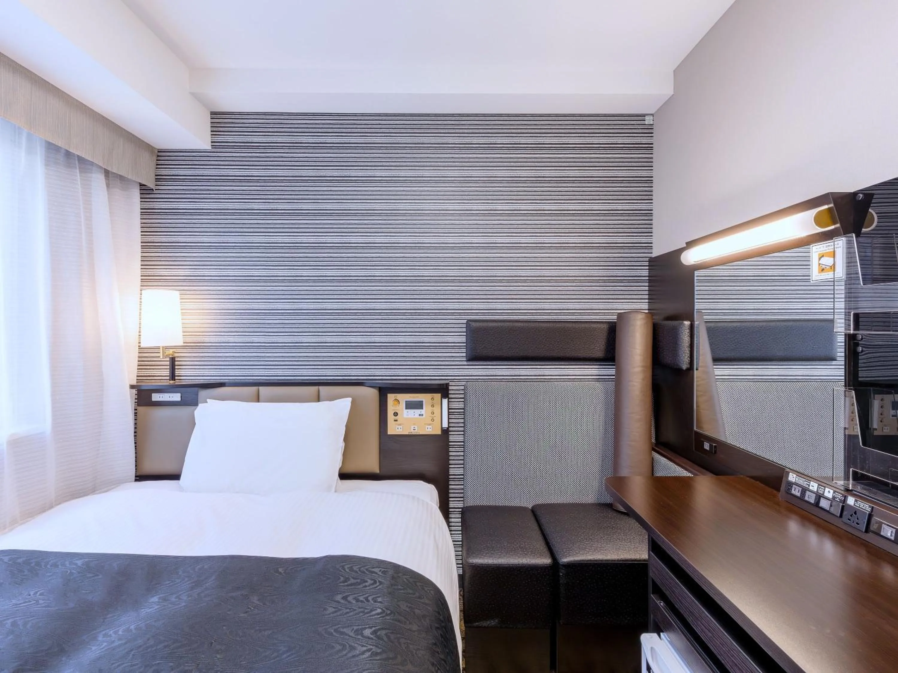 Photo of the whole room, Bed in APA Hotel Sapporo Odori Ekimae Nishi