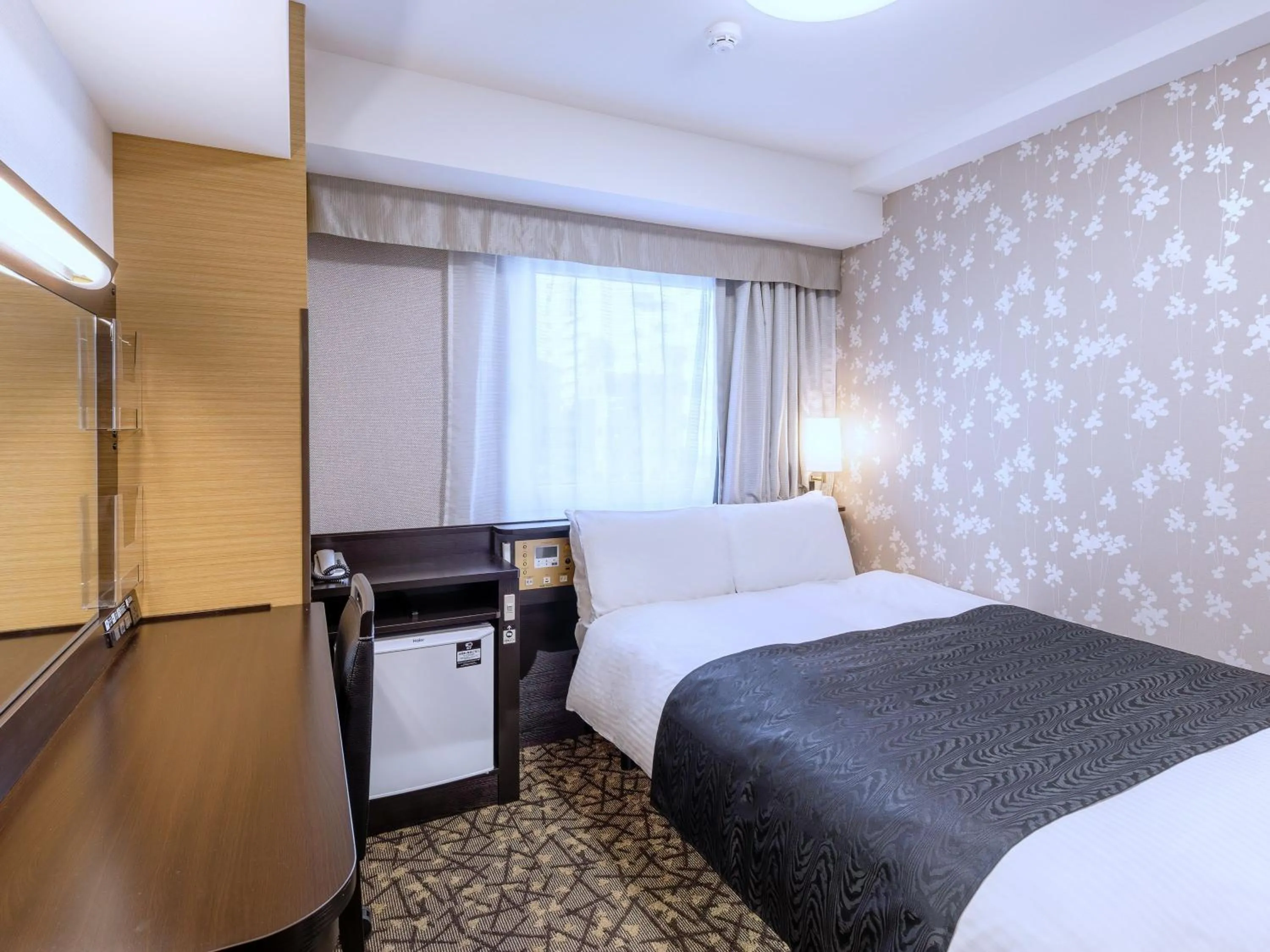 Photo of the whole room, Bed in APA Hotel Sapporo Odori Ekimae Nishi