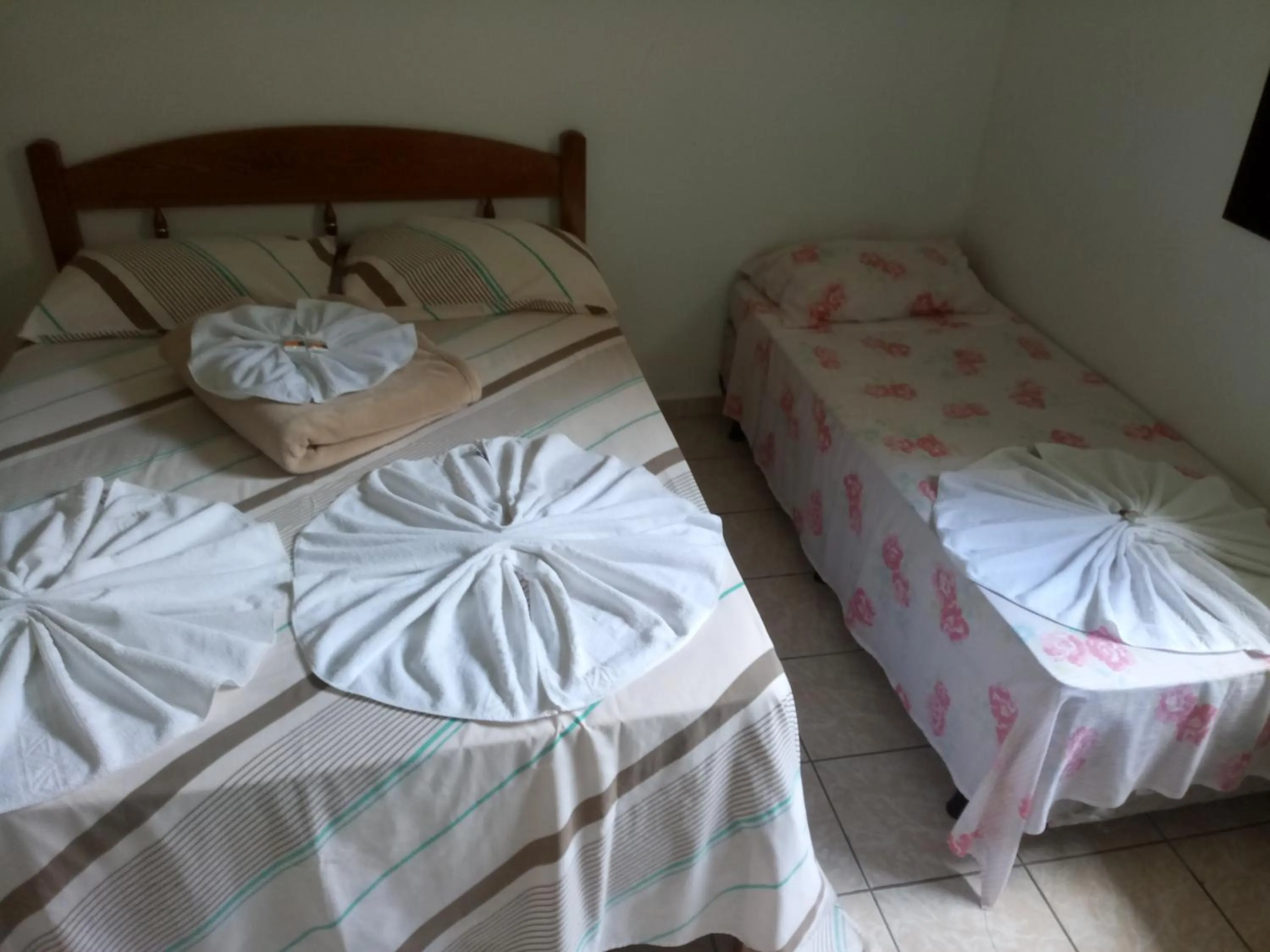 Bed in La Riviera Pousada Pantanal