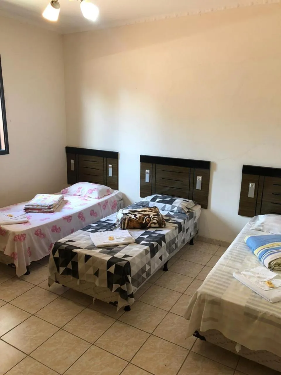 Bed in La Riviera Pousada Pantanal