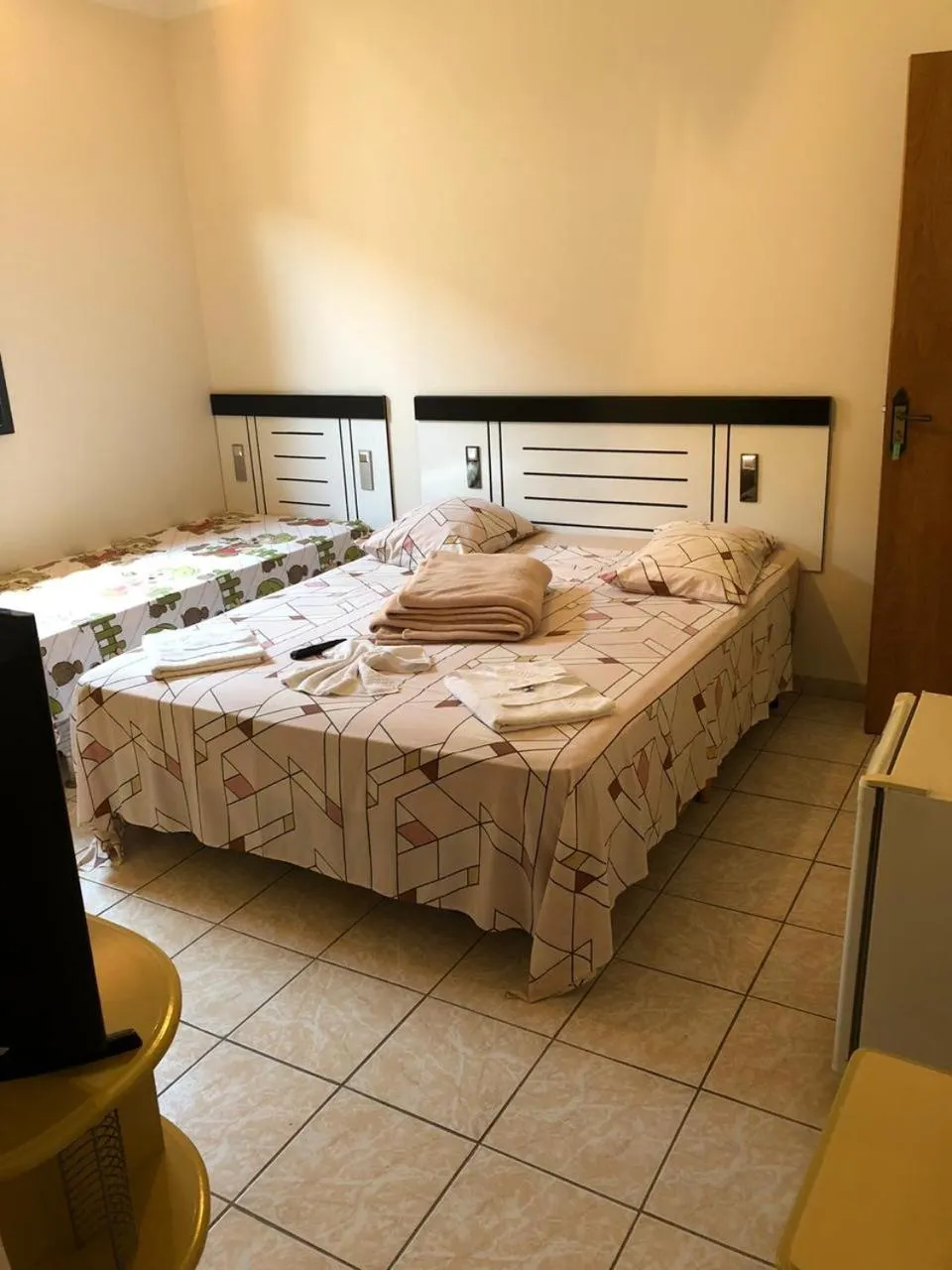 Bed in La Riviera Pousada Pantanal