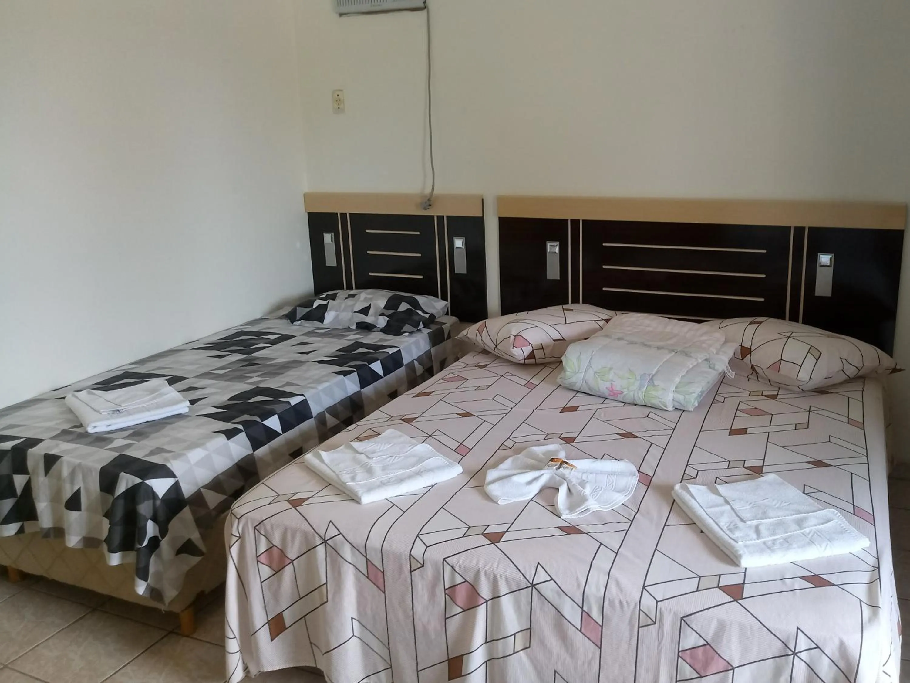 Bed in La Riviera Pousada Pantanal