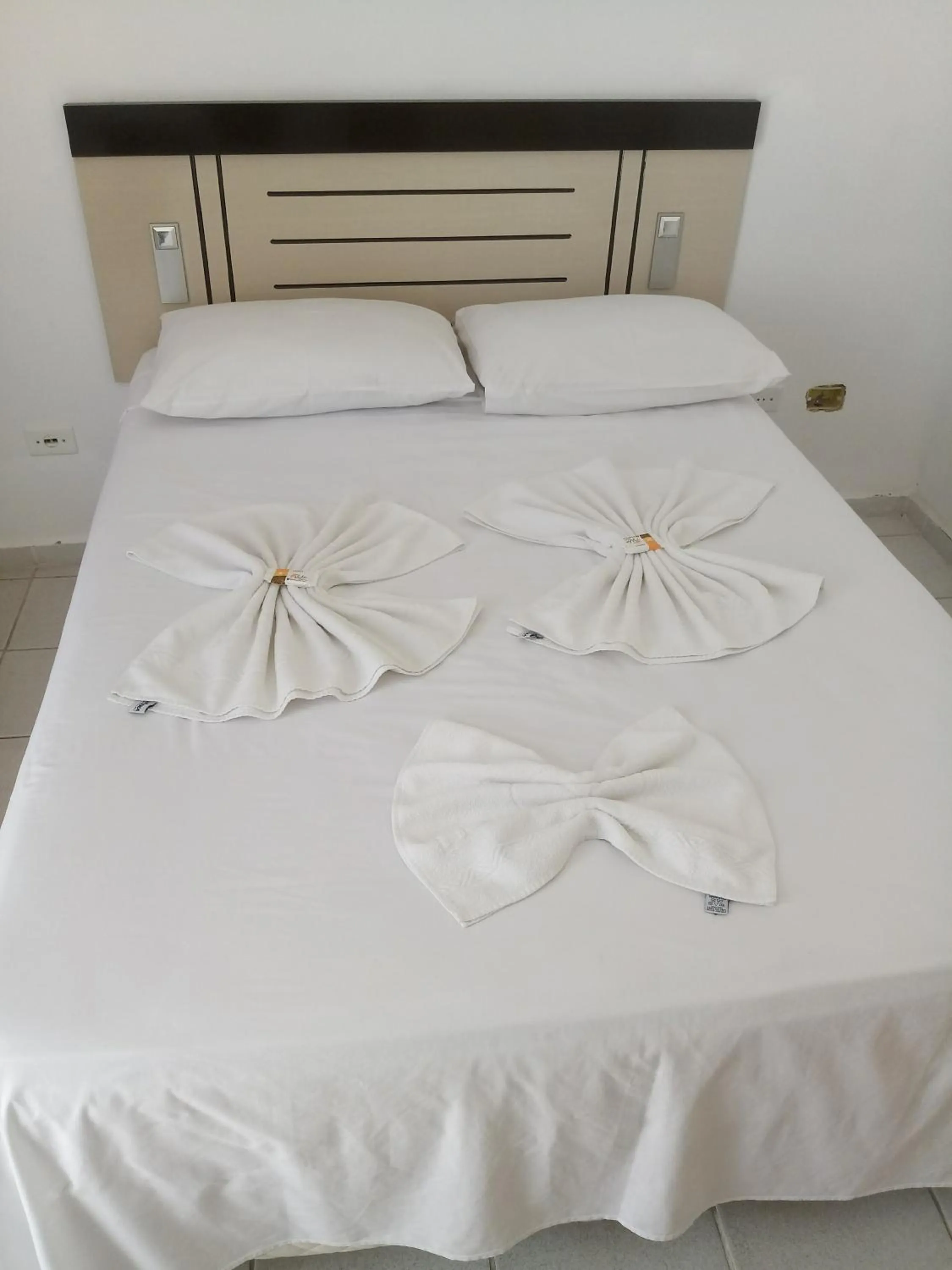 Bed in La Riviera Pousada Pantanal