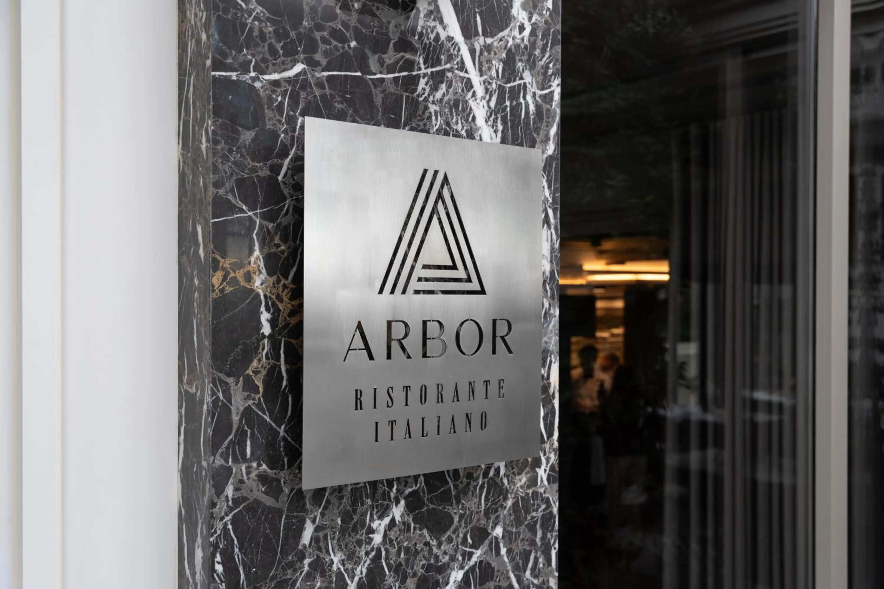 Property logo or sign in Arbor Hotel - Signature Collection