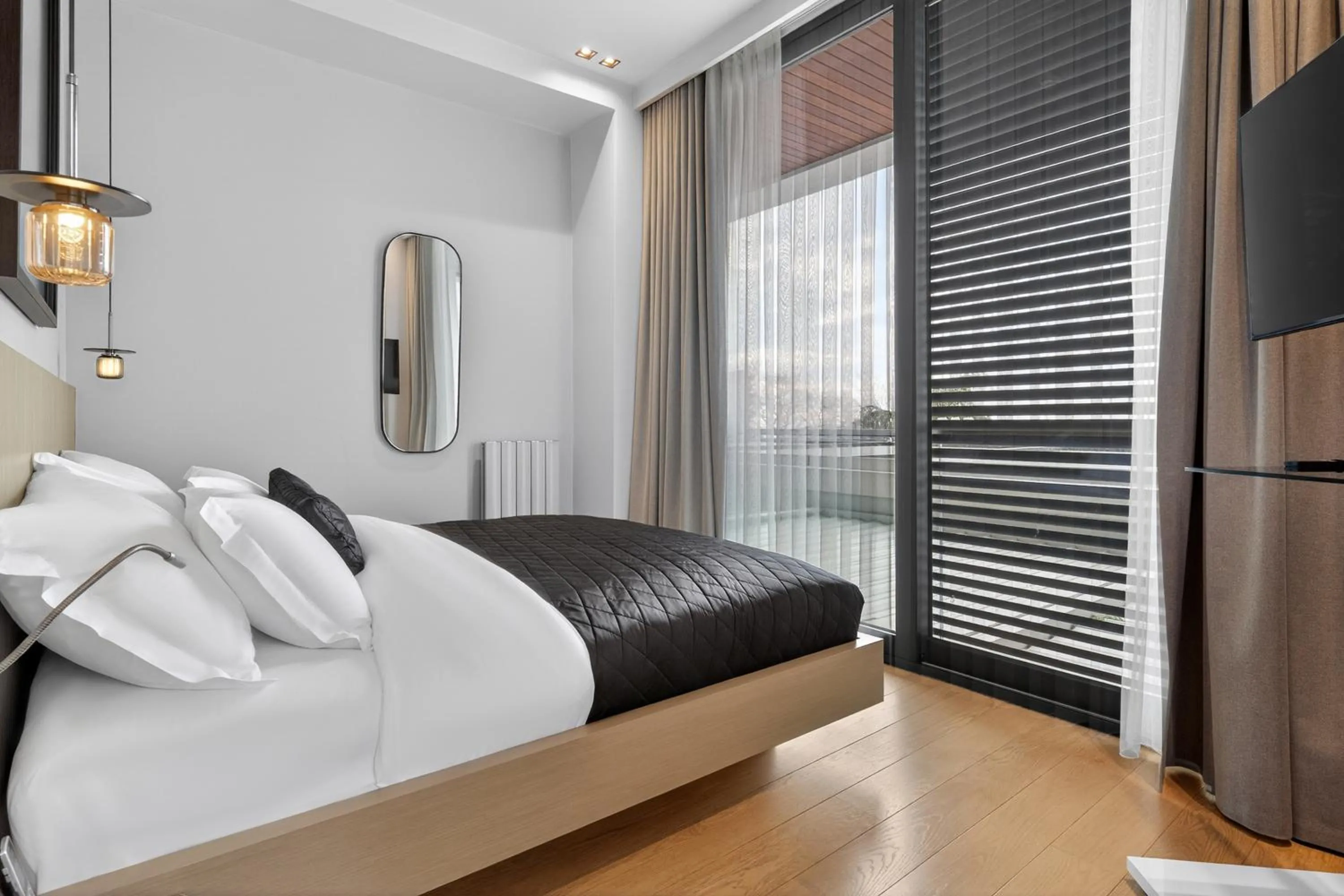 Bed in Arbor Hotel - Signature Collection