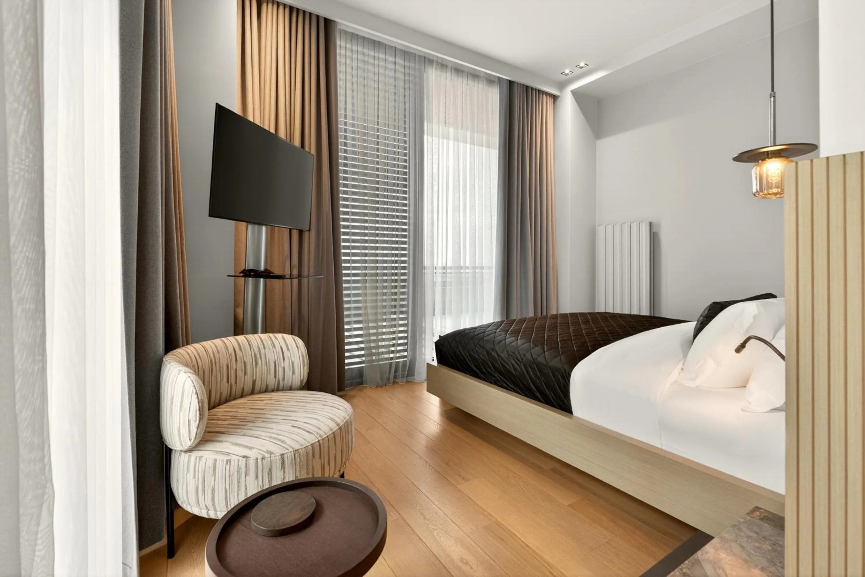 Bed in Arbor Hotel - Signature Collection