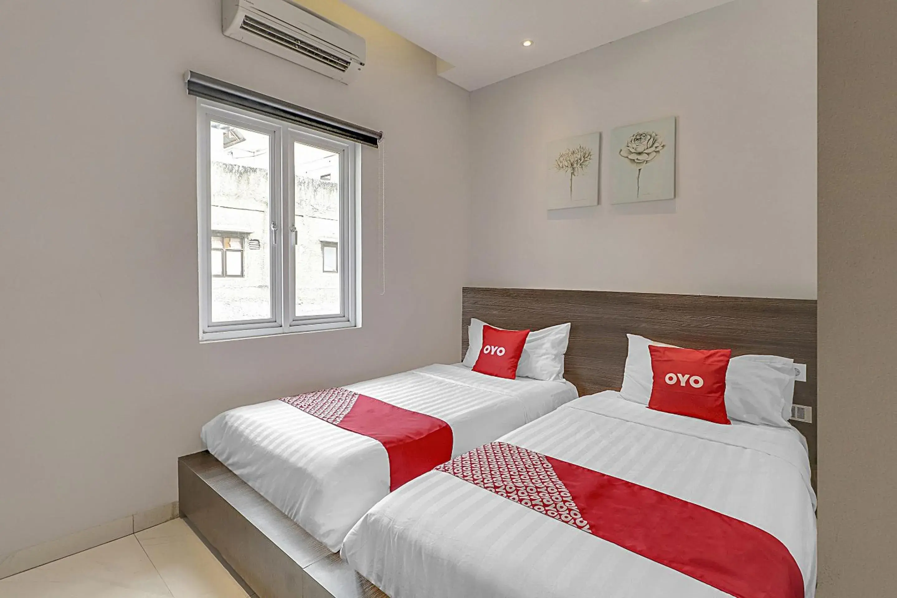 Superior Twin Room in Capital O 94727 Regia Cihampelas Ciwalk Superior Twin Room in Capital O 94727 Regia Cihampelas Ciwalk