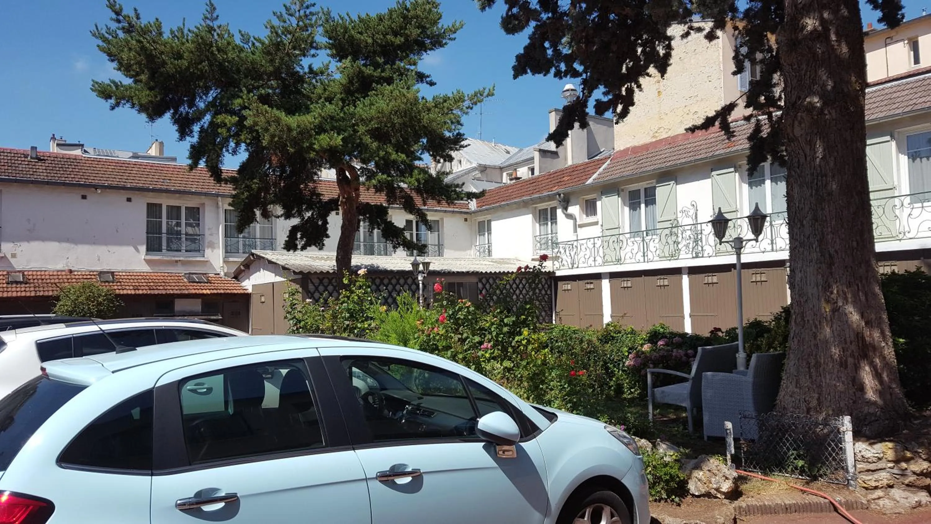 Garden in Hôtel du Cheval Rouge