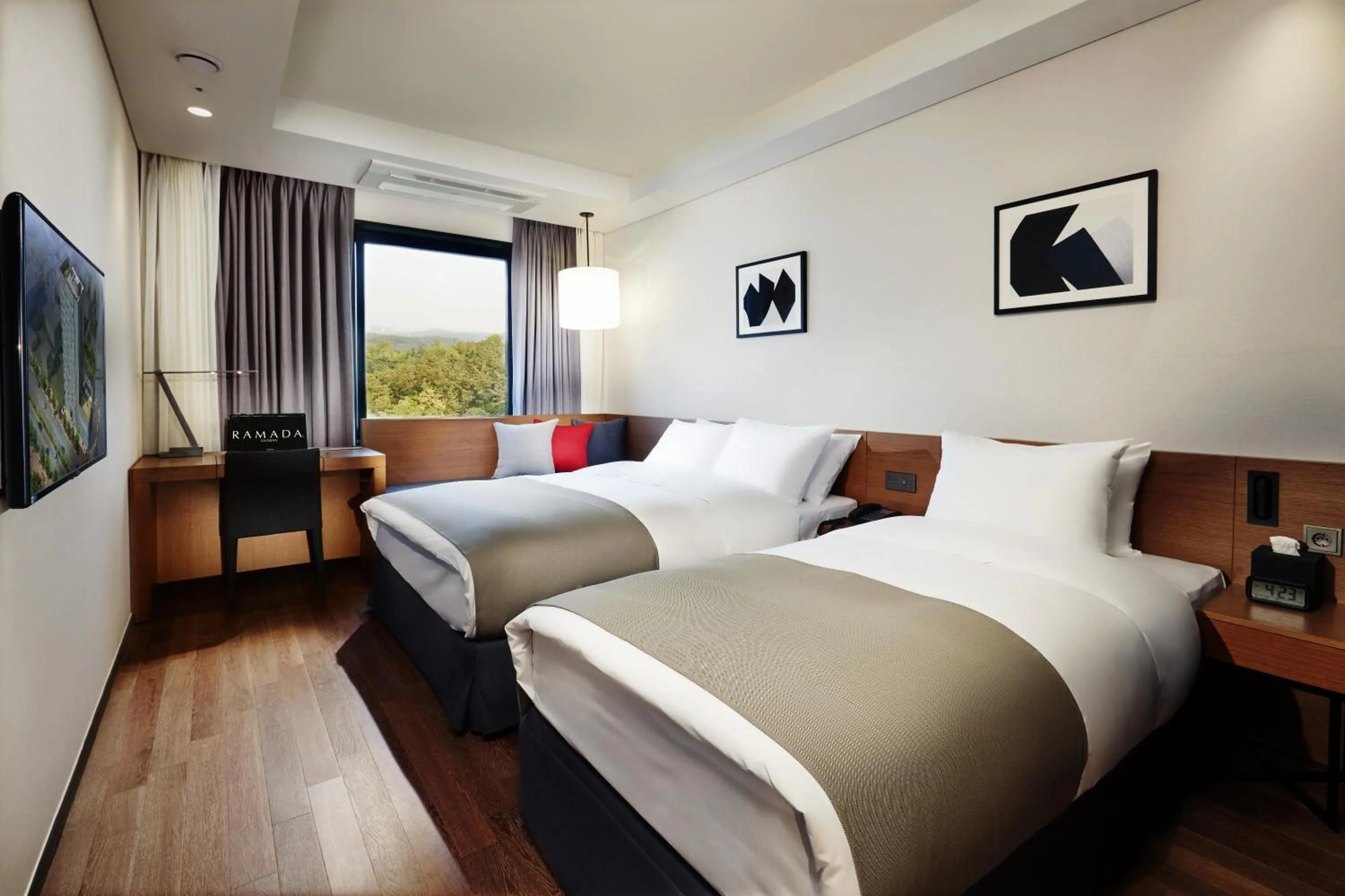 Bedroom in Ramada by Wyndham Gunsan