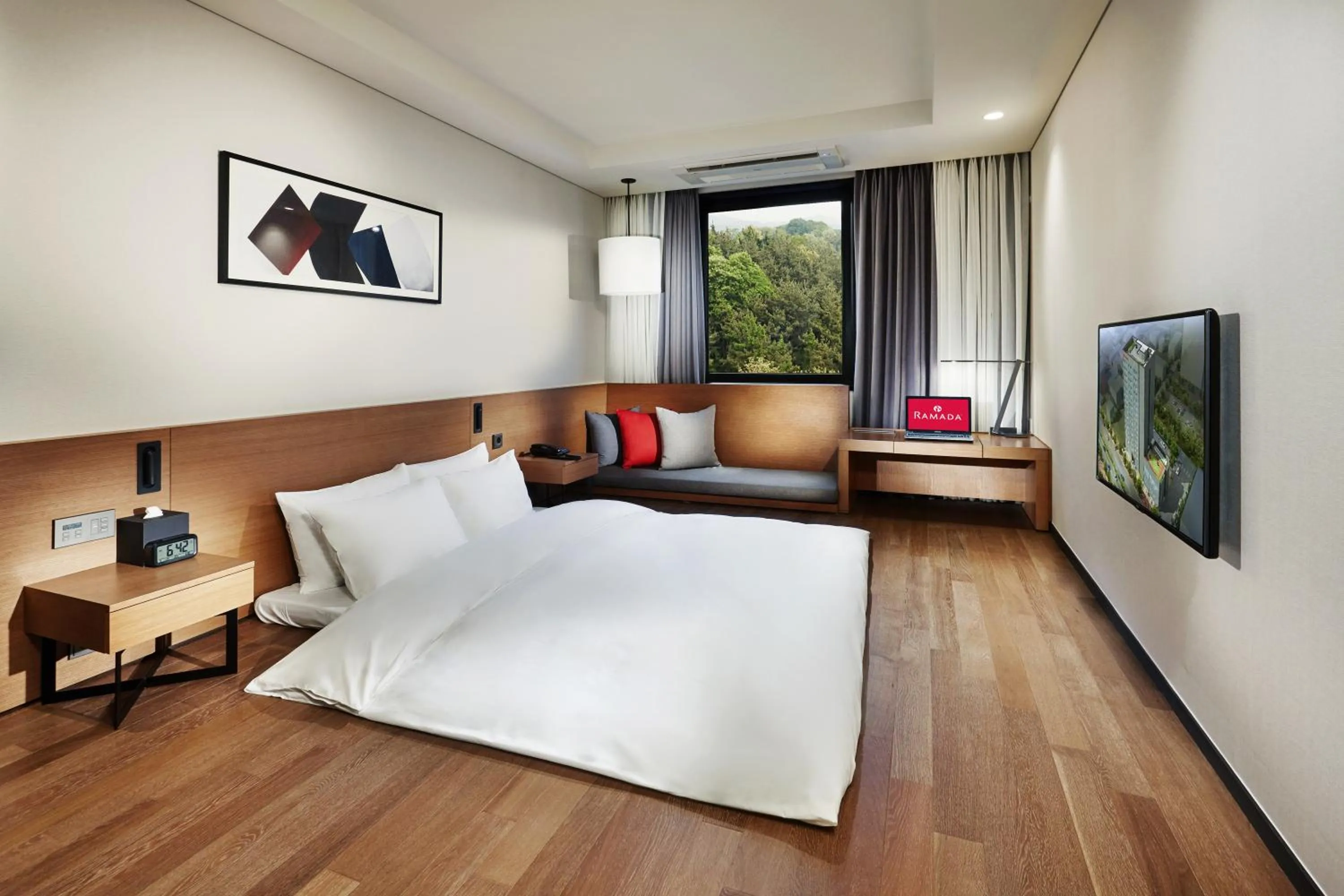 Bedroom in Ramada by Wyndham Gunsan