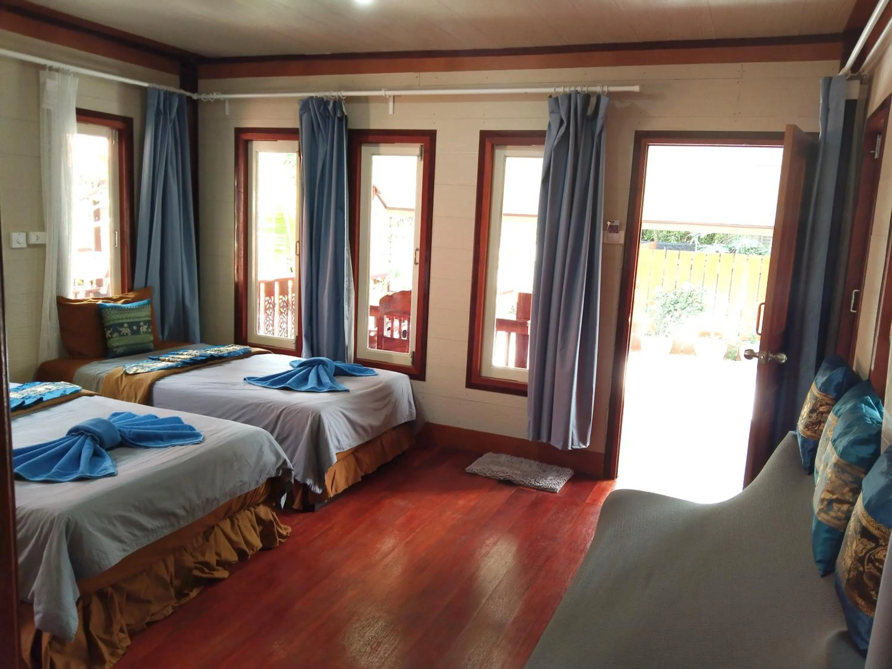Bed in Coco Beach Bungalows