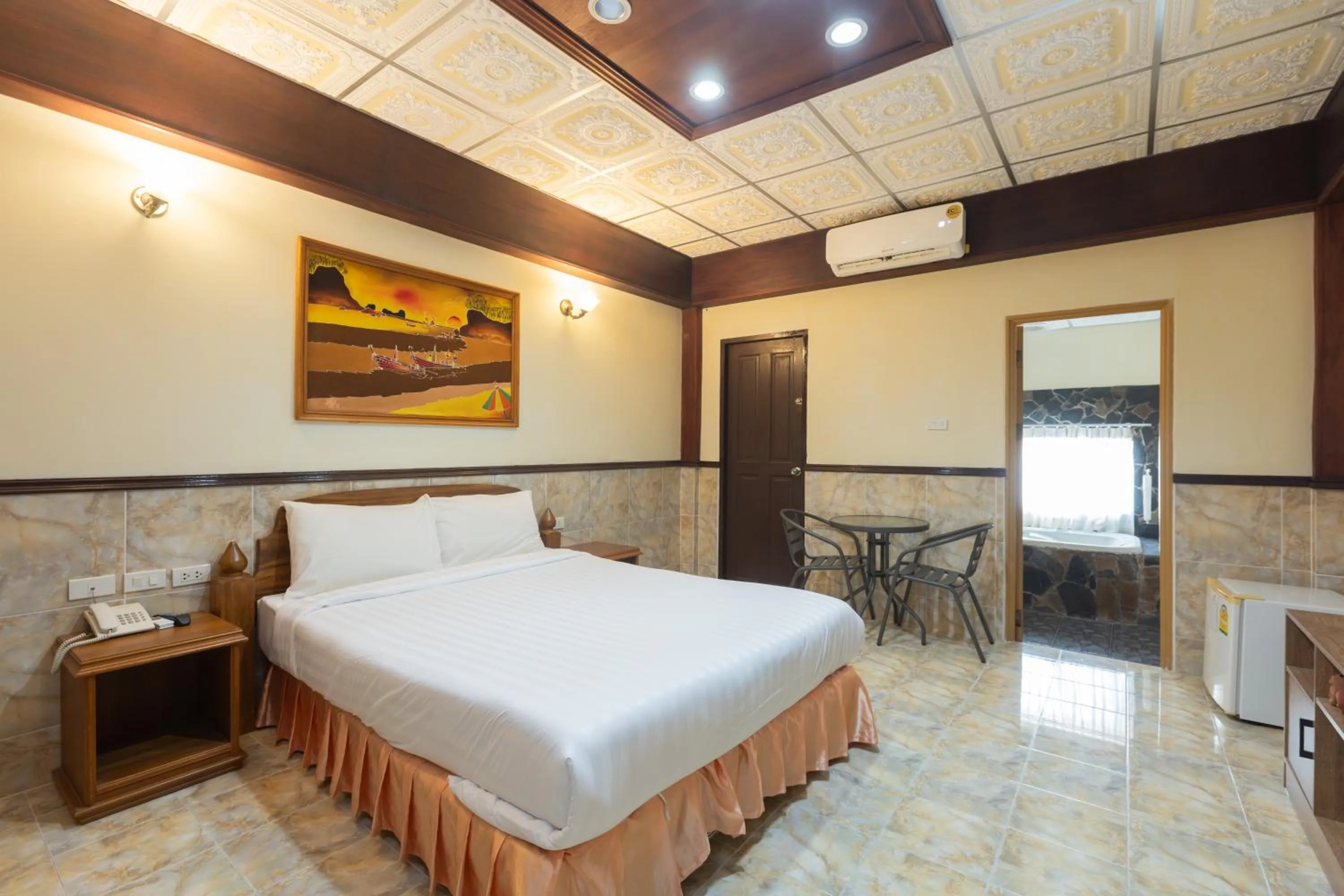 Bed in Kata Palace Phuket Hotel