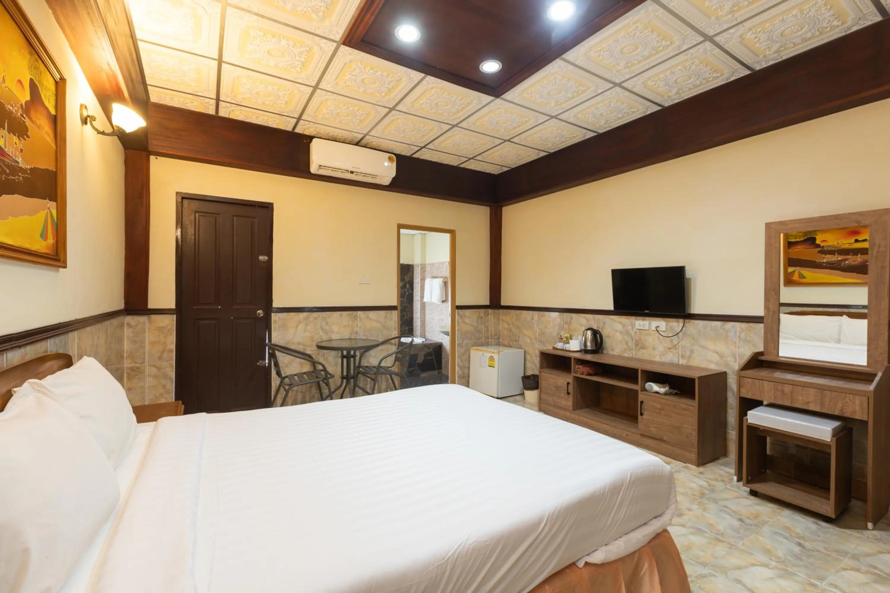 Bed in Kata Palace Phuket Hotel