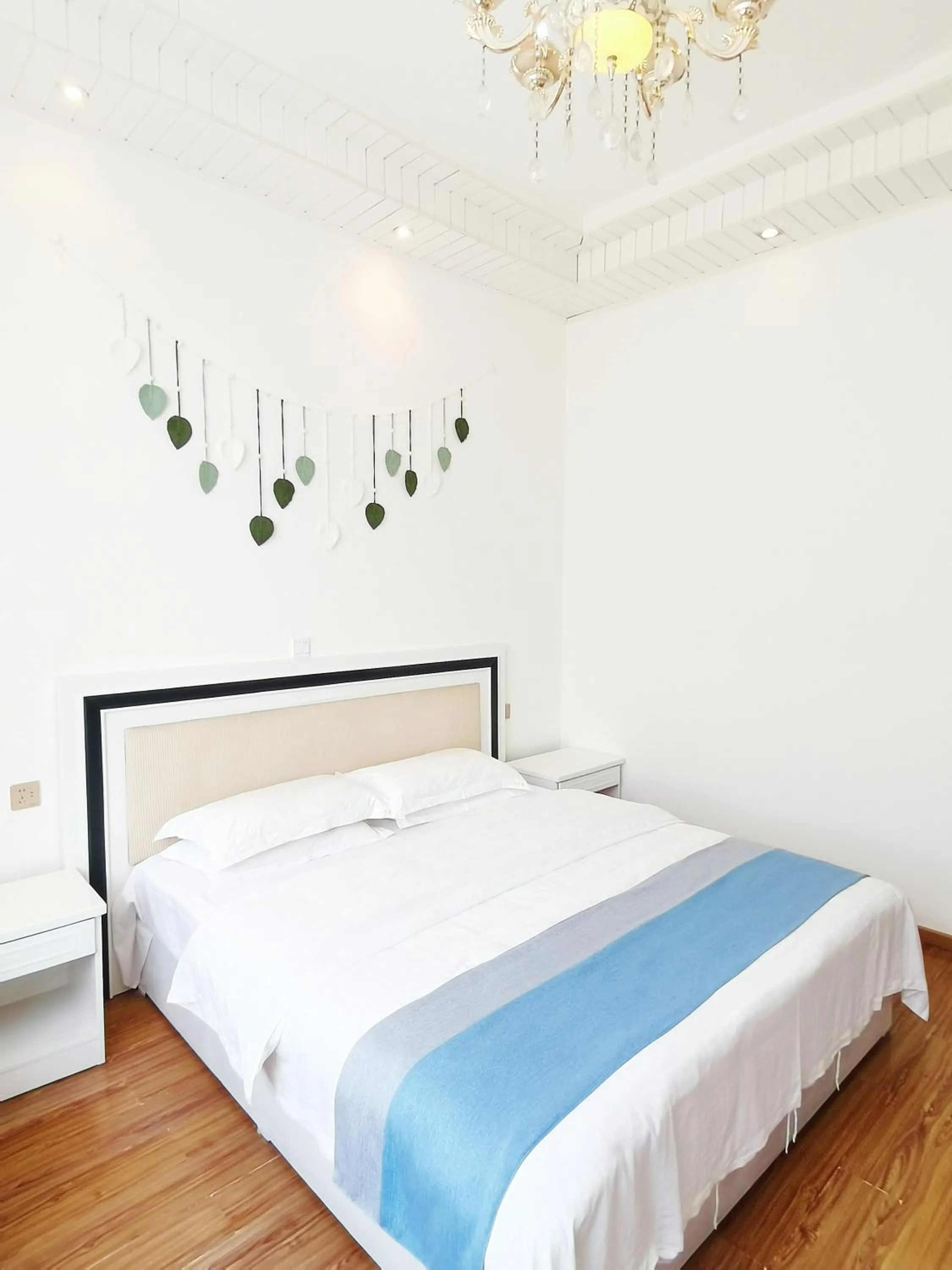 Bed in Emeishan Moon Bay Hotel