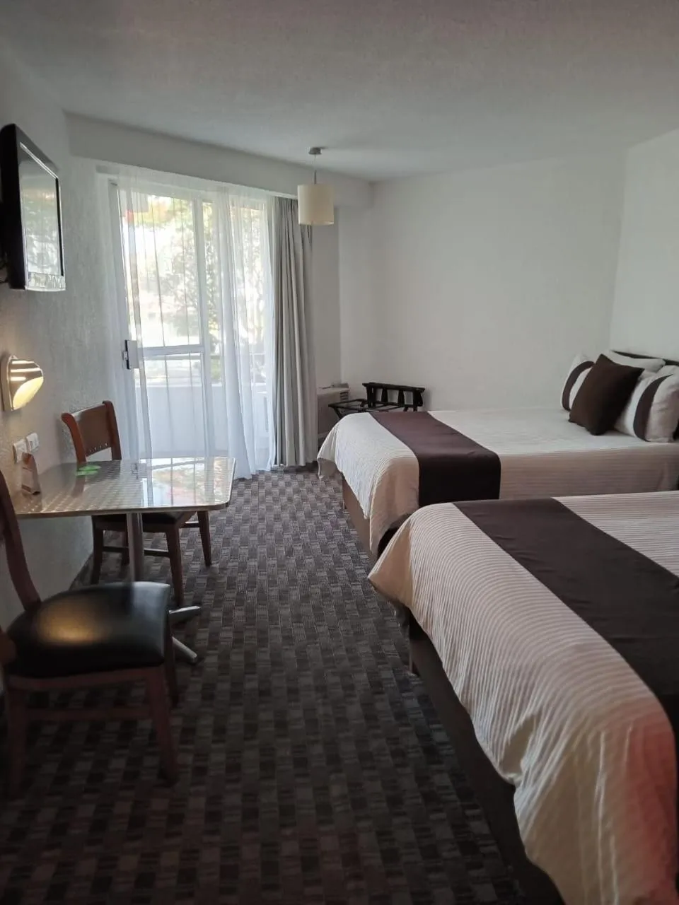 Bed in Hotel Misión Campeche