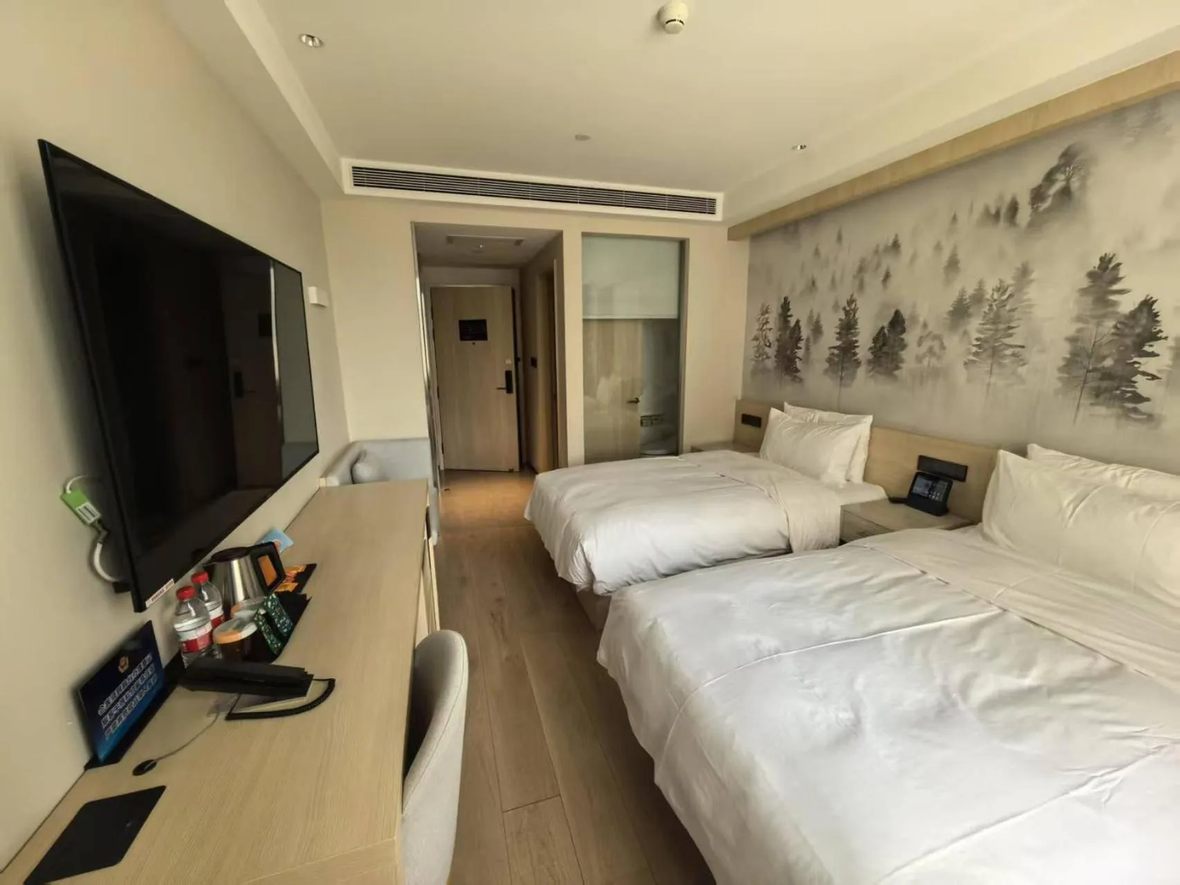 Photo of the whole room, Bed in Orange Hotel Beijing South Railway Station South Square